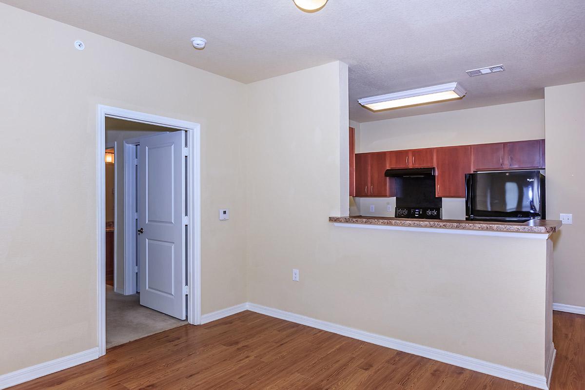 a kitchen with a wood floor