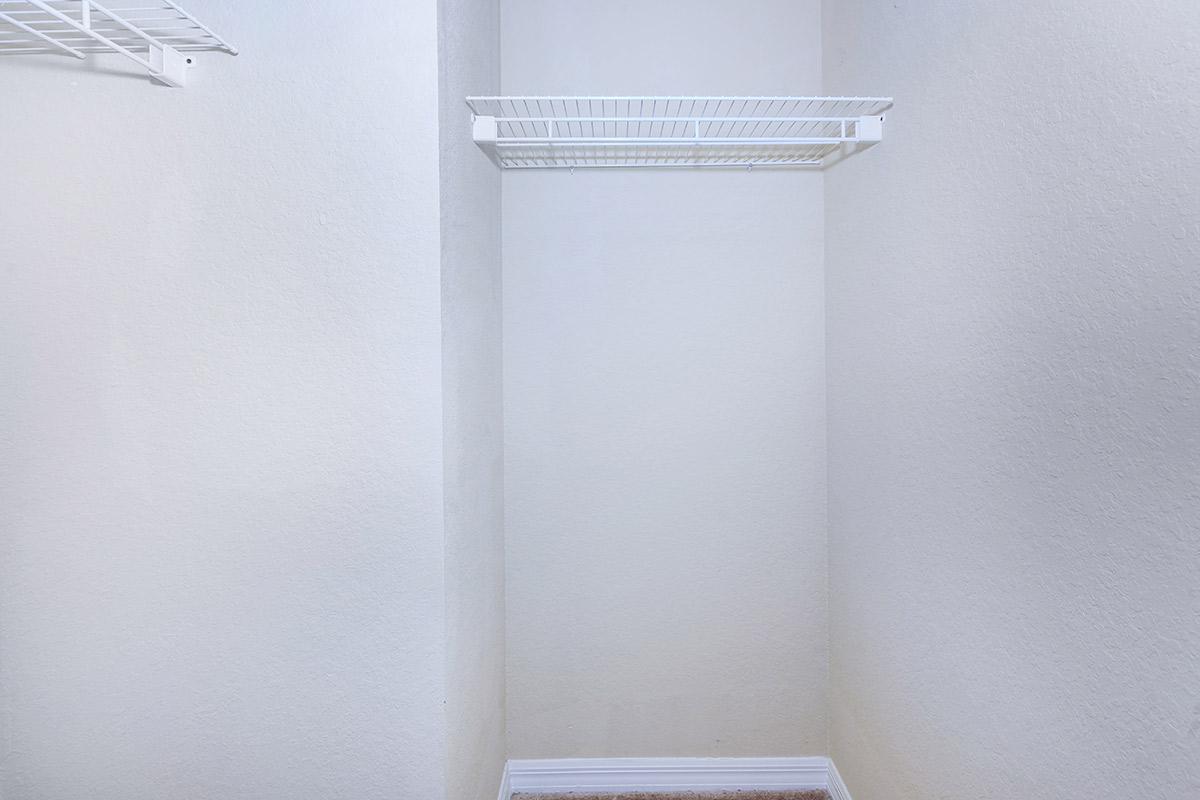 a white refrigerator freezer sitting in a room