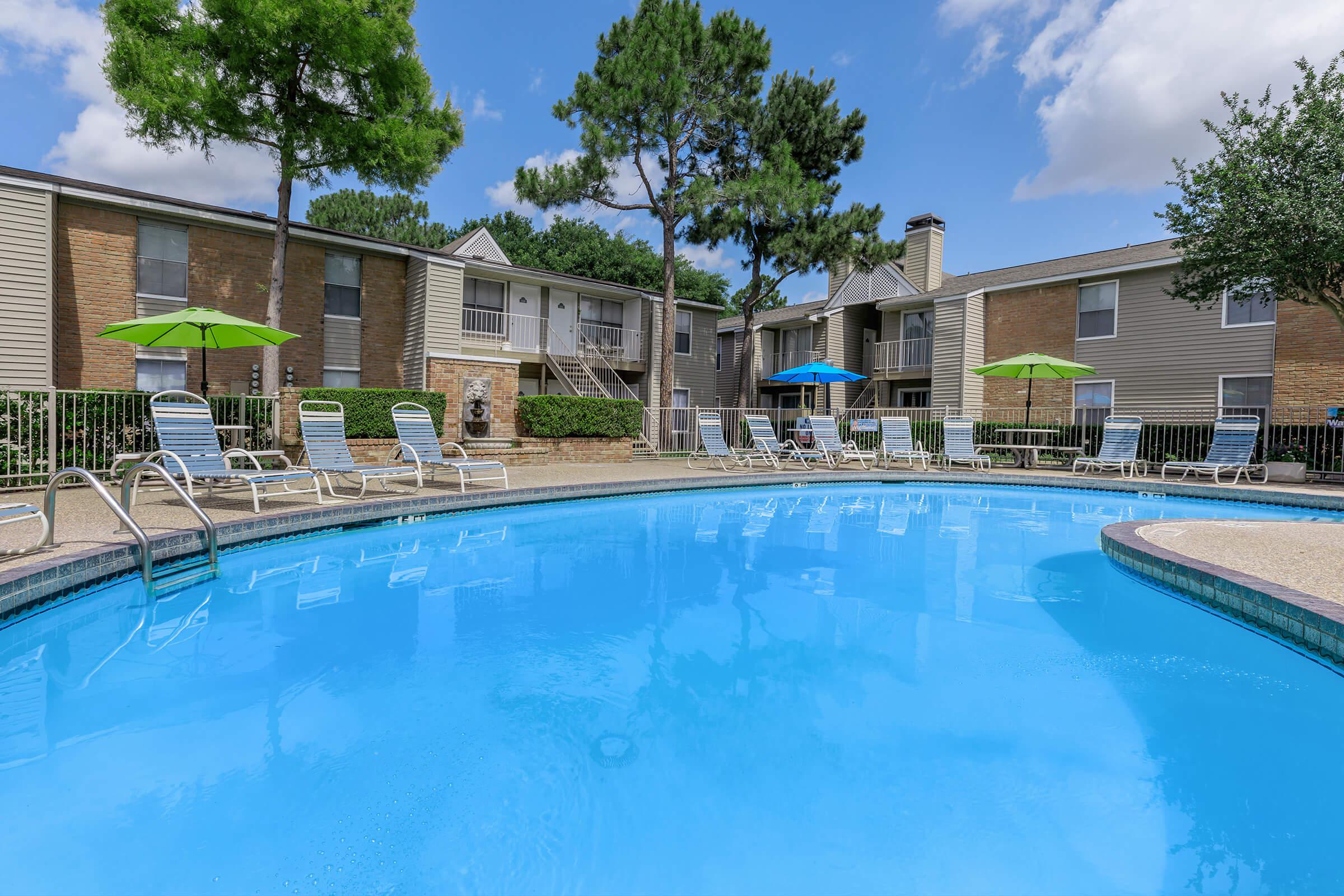 a house with a large pool of water