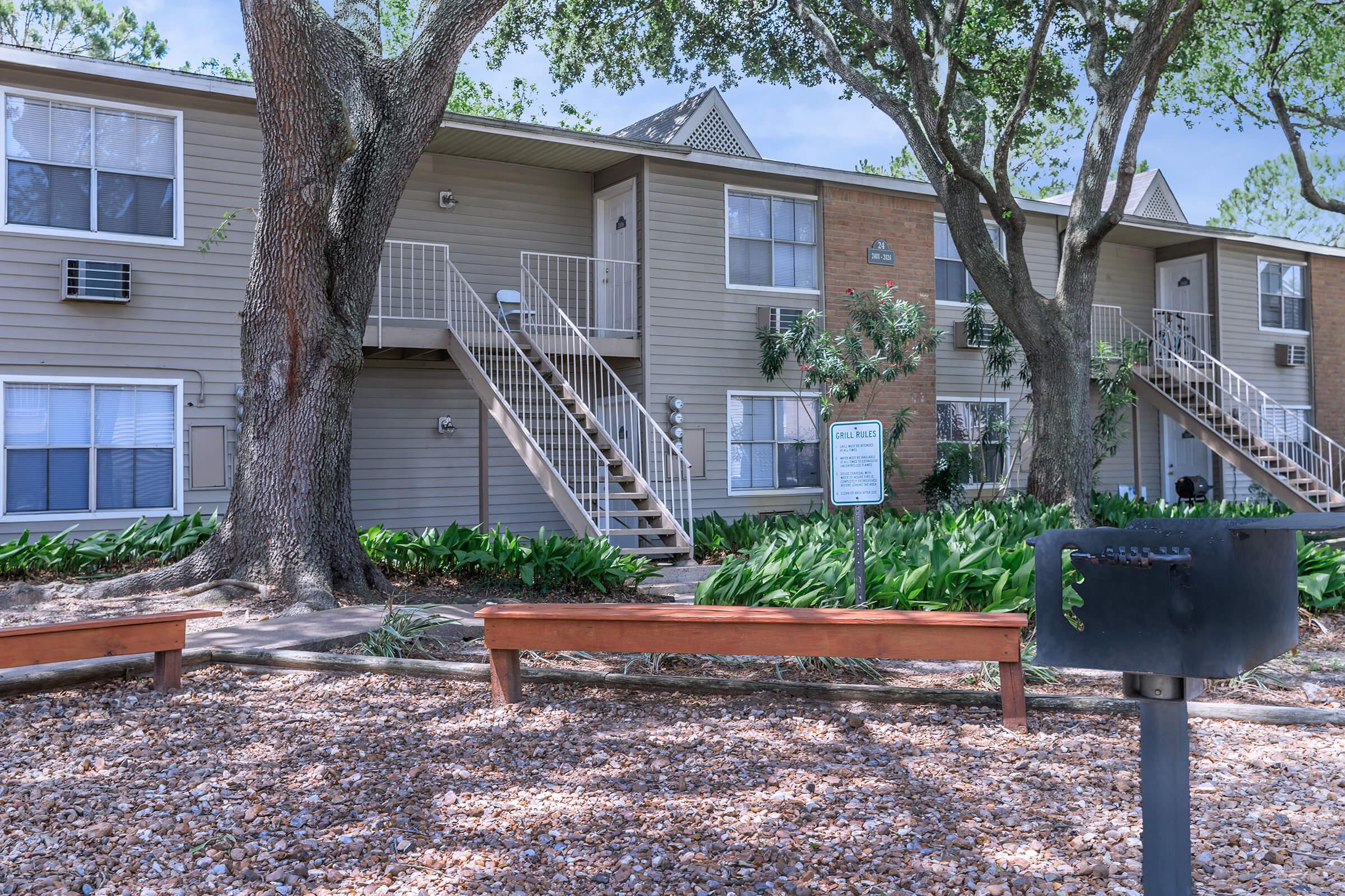 a bench in front of a house