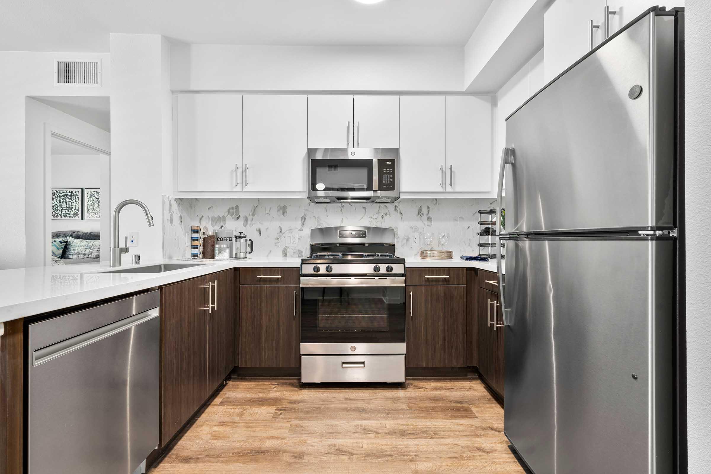 a stainless steel refrigerator in a kitchen