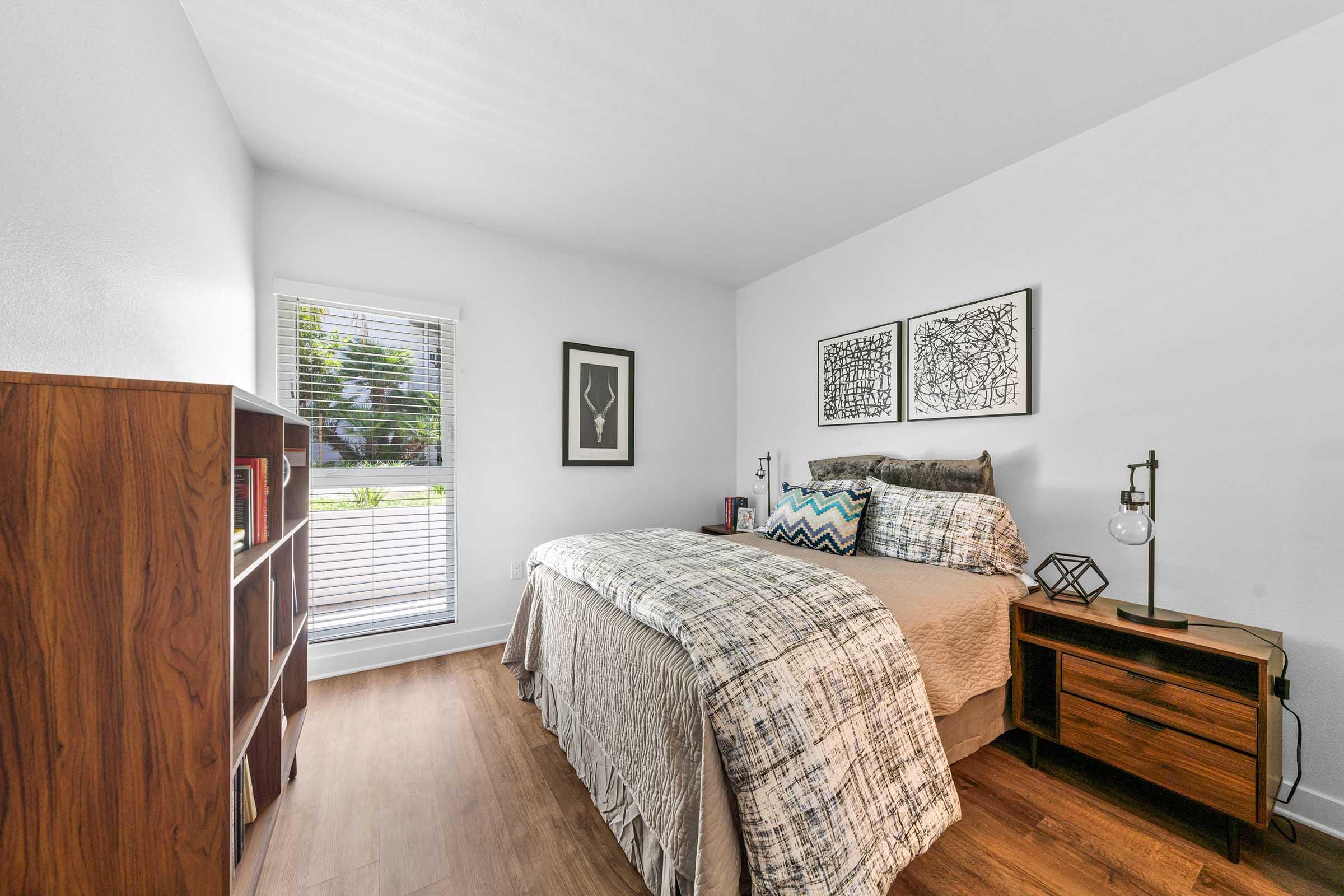 a bedroom with a nightstand