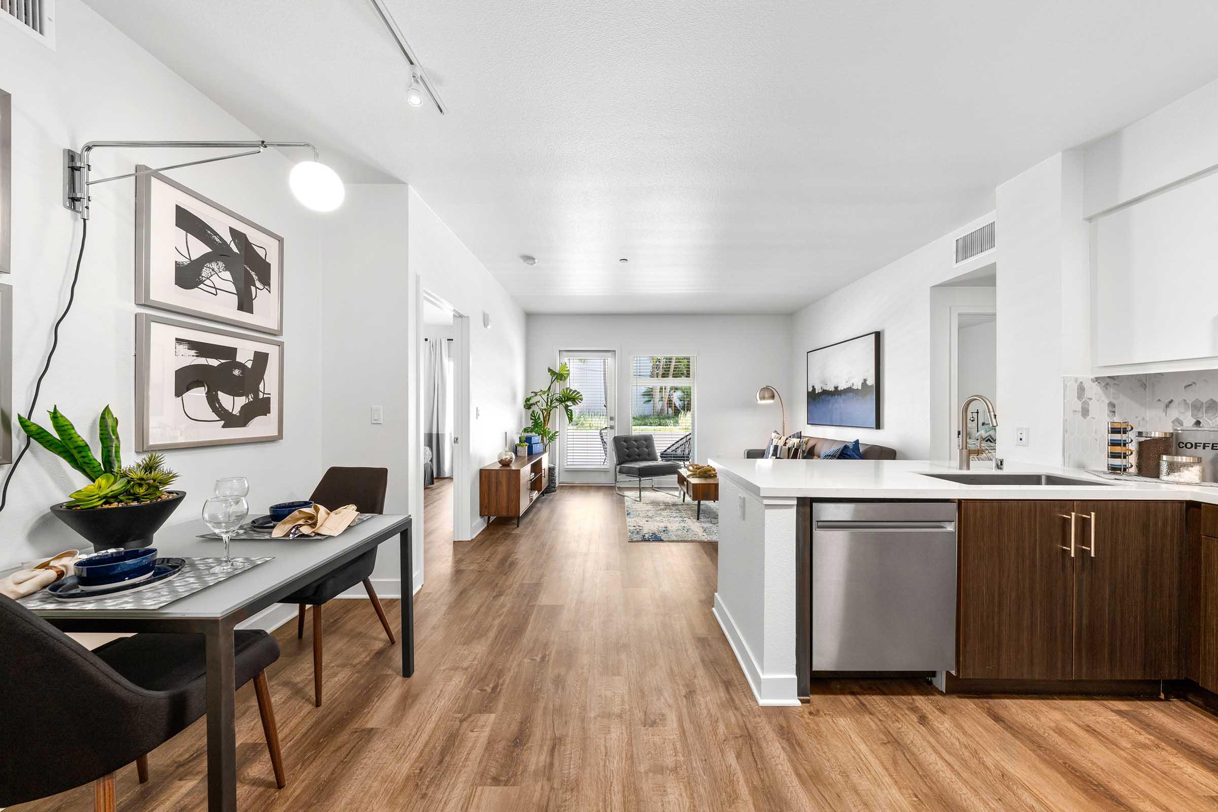 a room filled with furniture and a wood floor