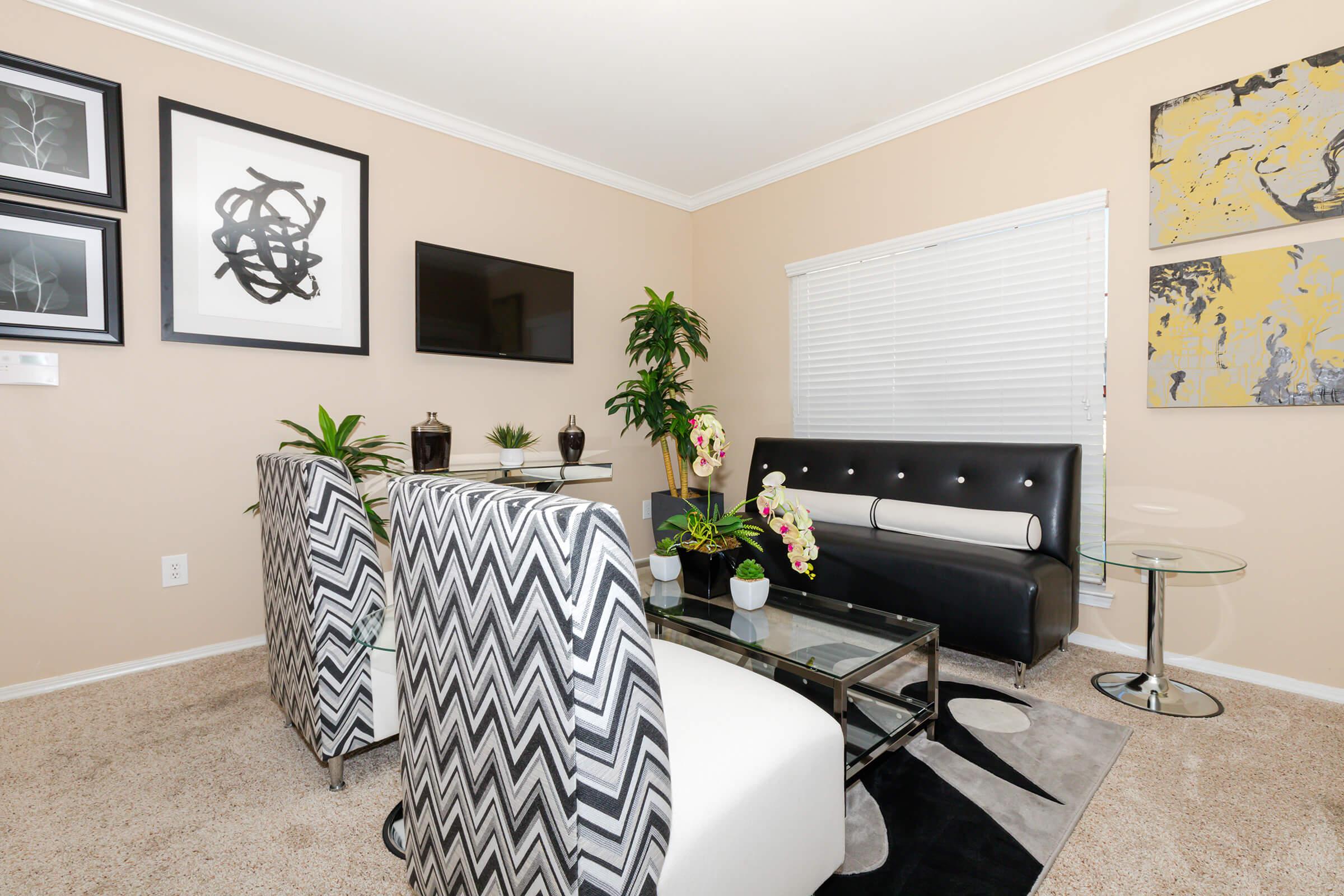 living room with a black couch