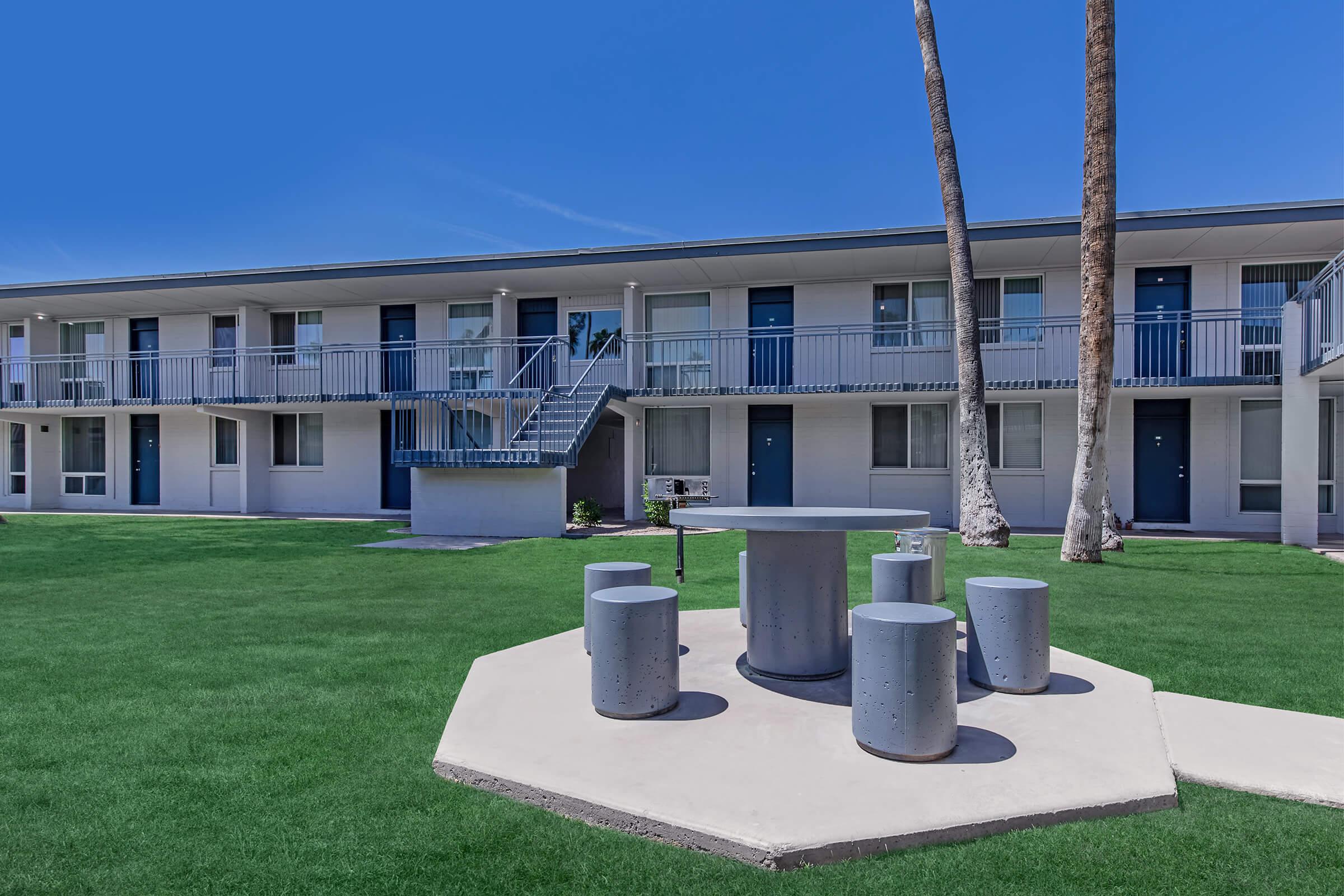 a large lawn in front of a building