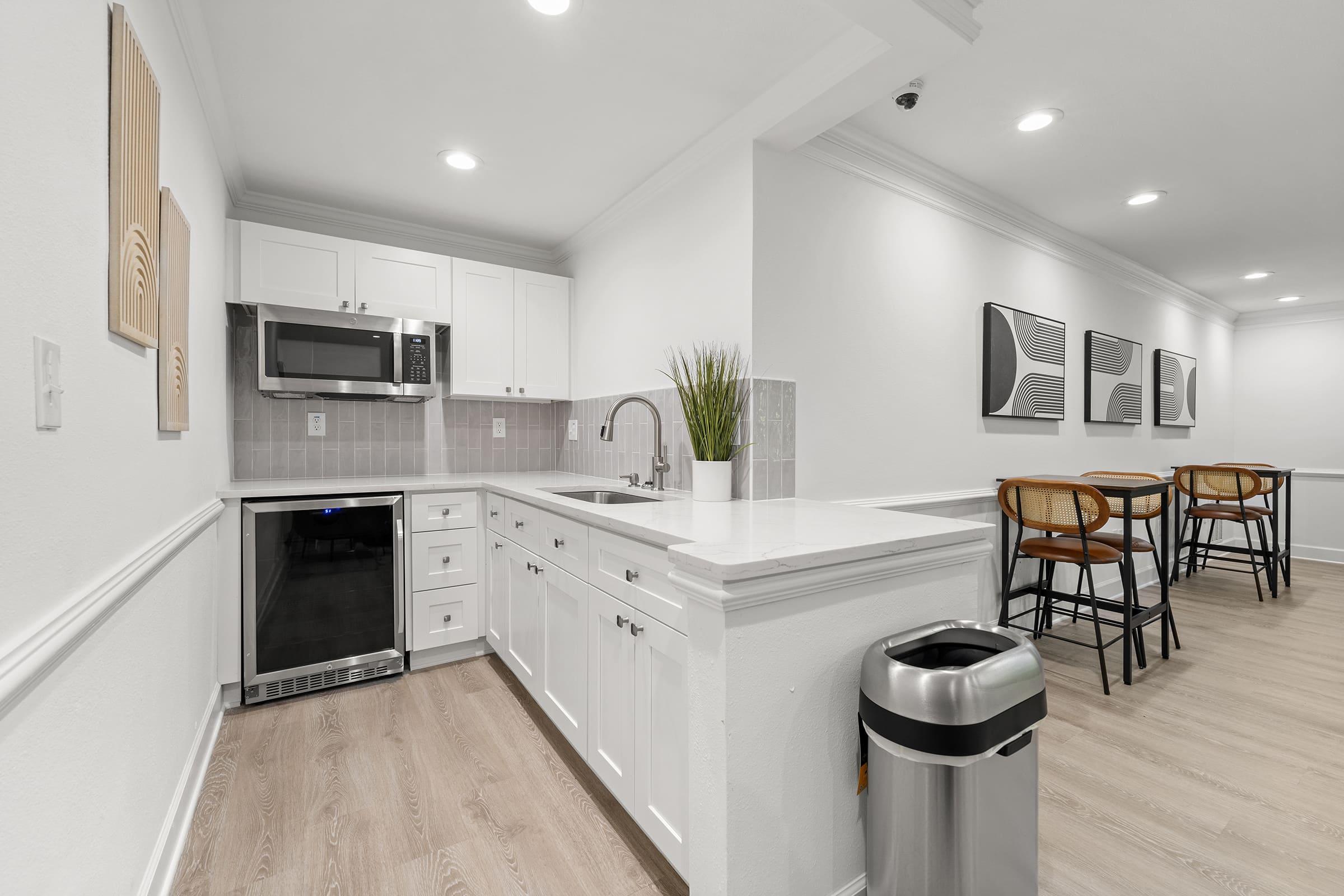 a kitchen with a table in a room