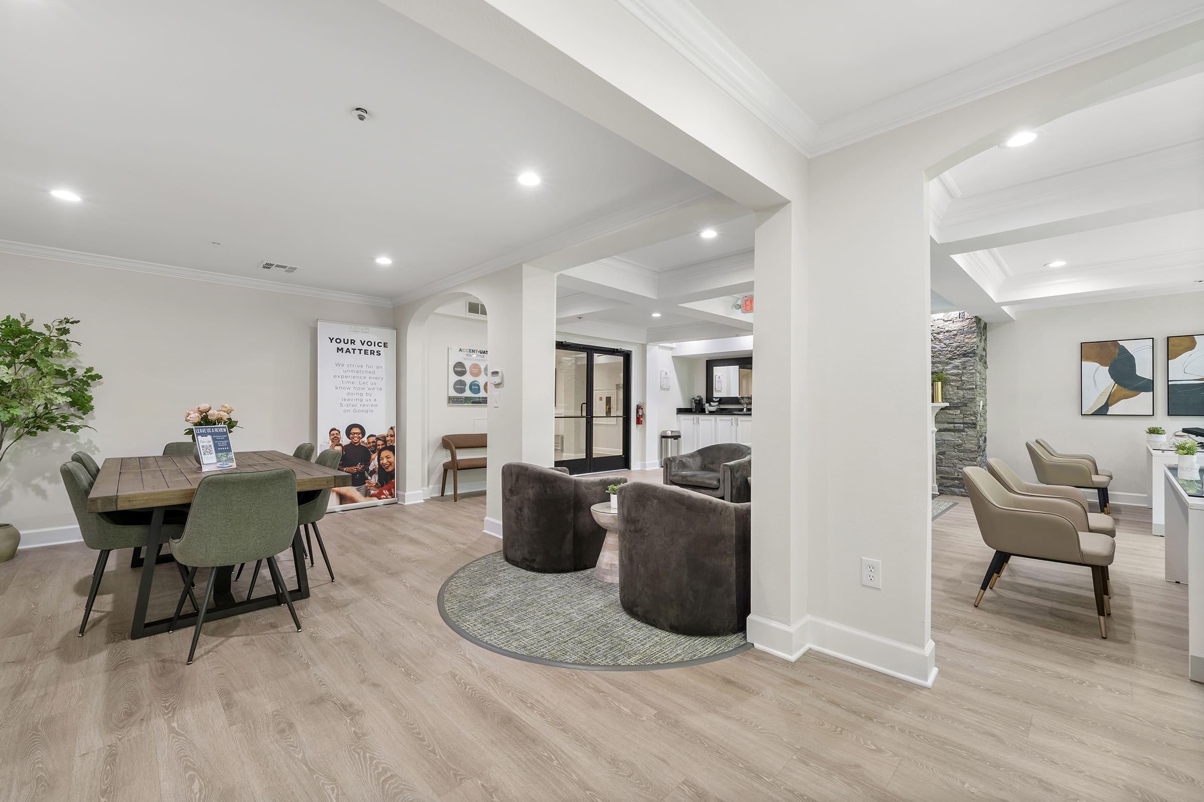 a living room filled with furniture and a fireplace