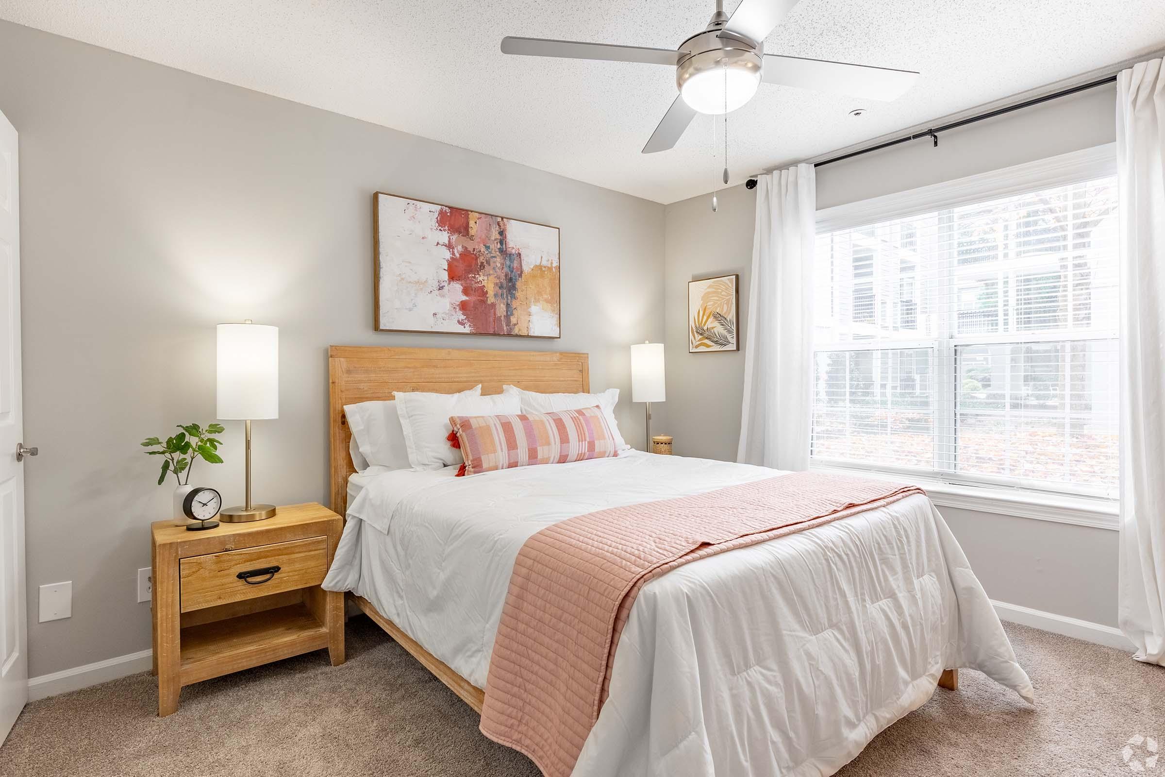 a bedroom with a bed in a hotel room