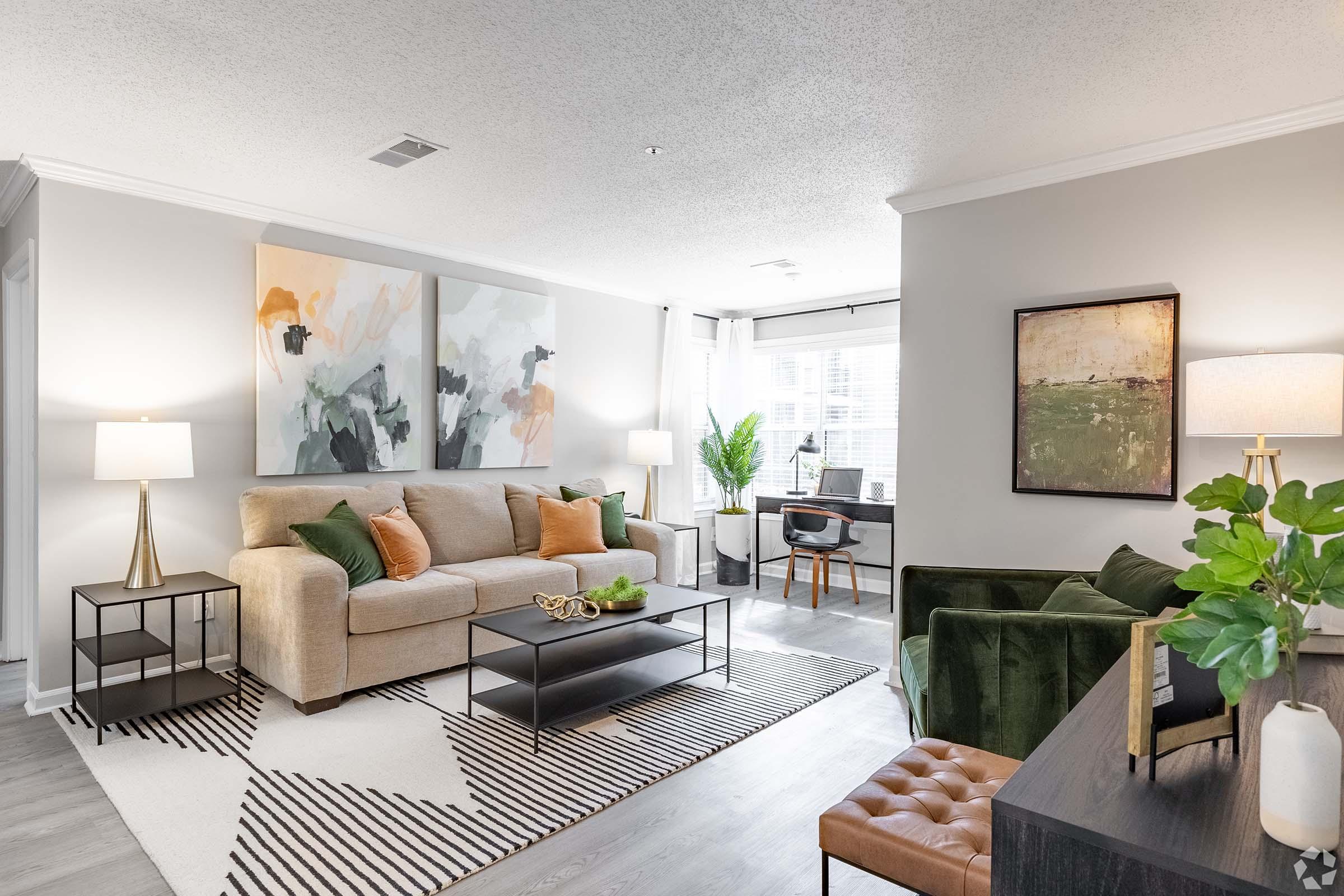 a living room filled with furniture and a fire place