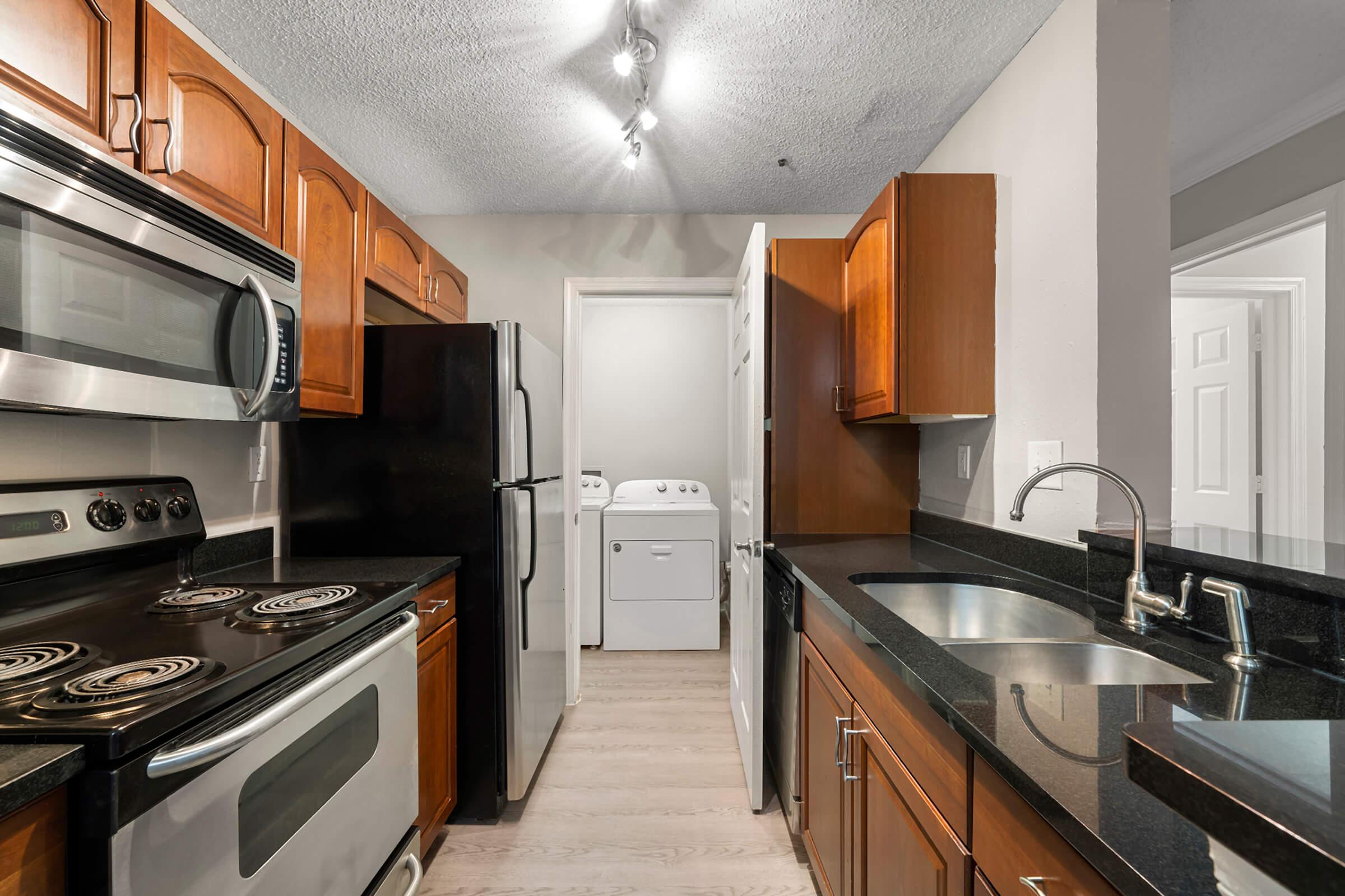 a modern kitchen with stainless steel appliances