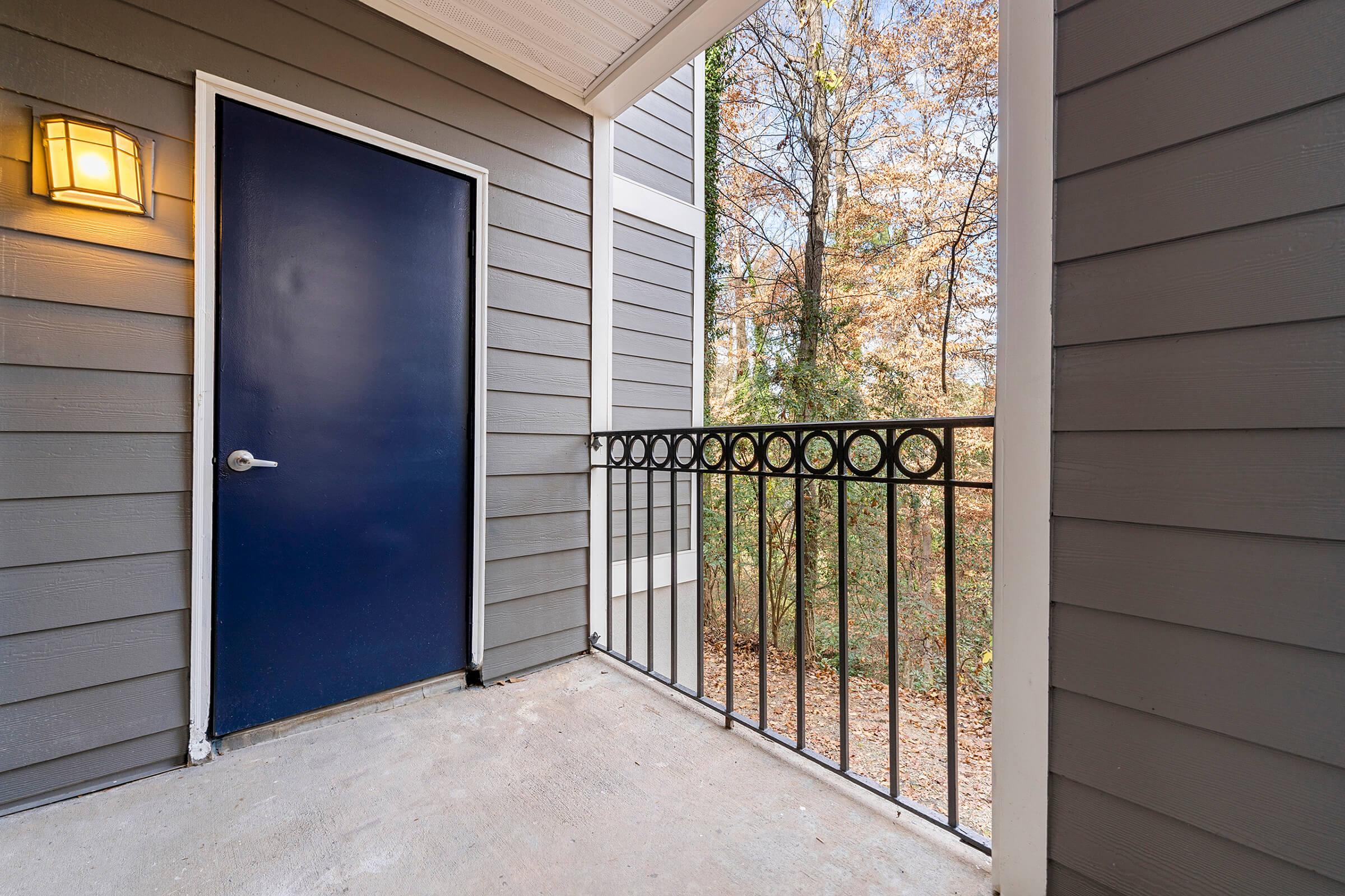 a door is open to a brick building