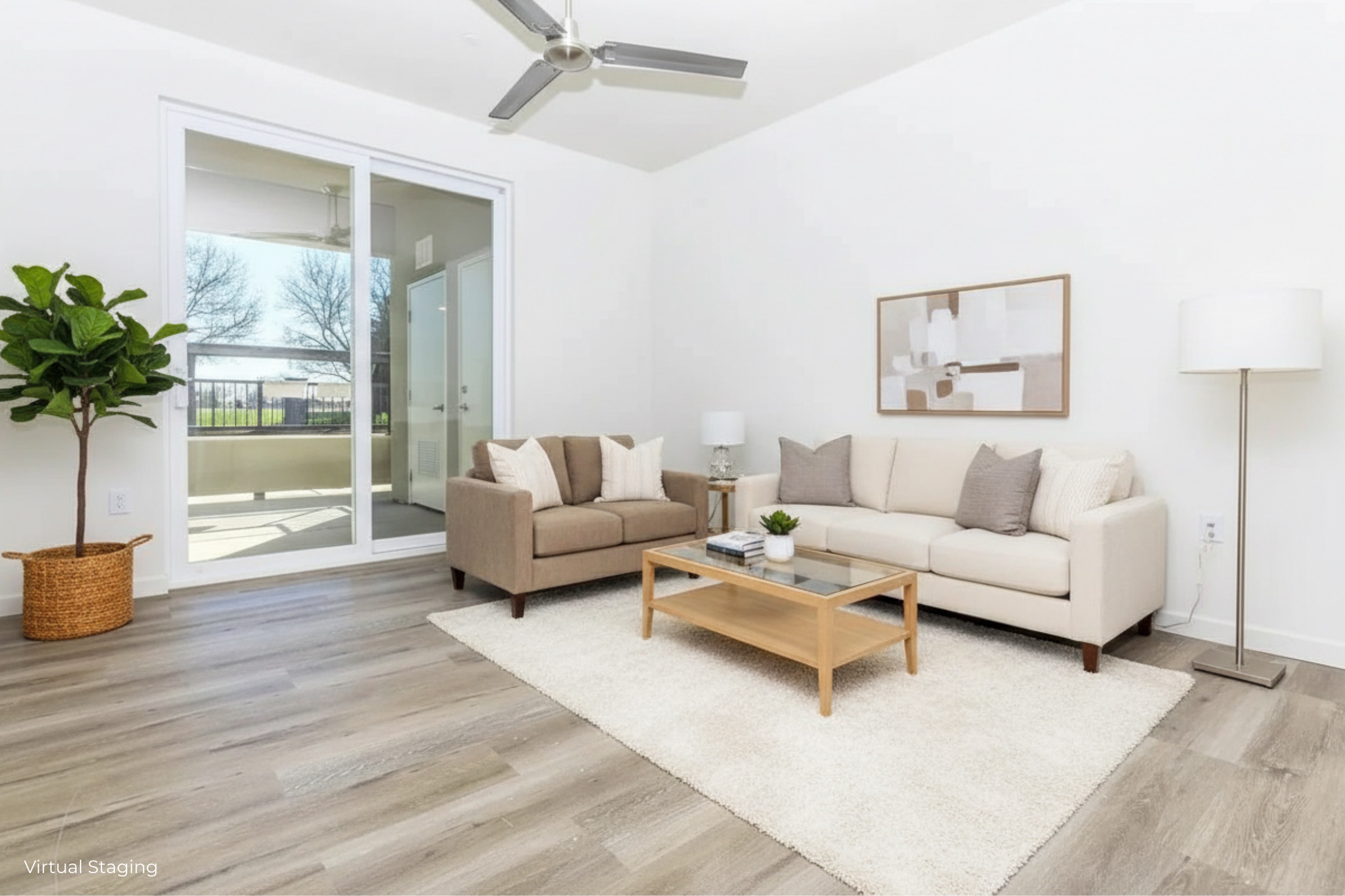 A modern living room featuring a light-colored sofa and a brown accent chair, a wooden coffee table on a soft rug, a floor lamp, a potted plant, and a large window letting in natural light. The decor is minimalistic and inviting, with a calming palette of neutral tones.