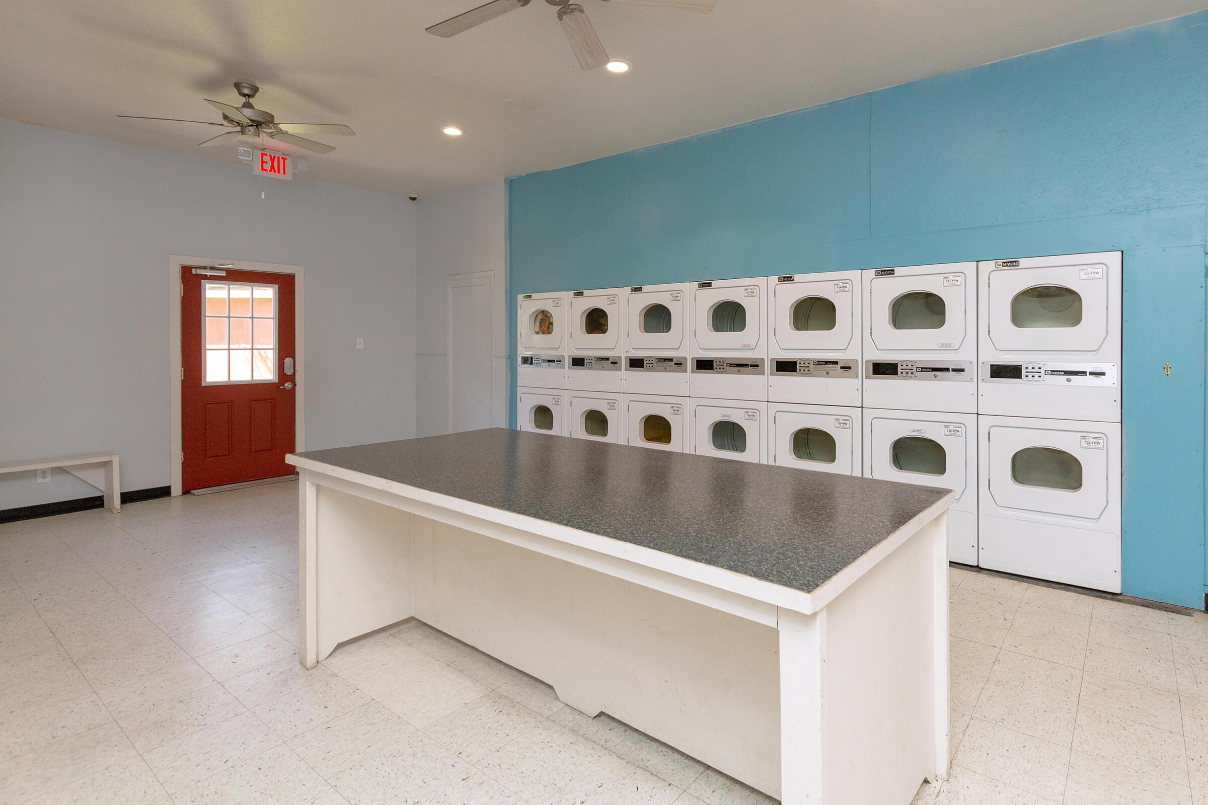 a white stove top oven sitting inside of a room