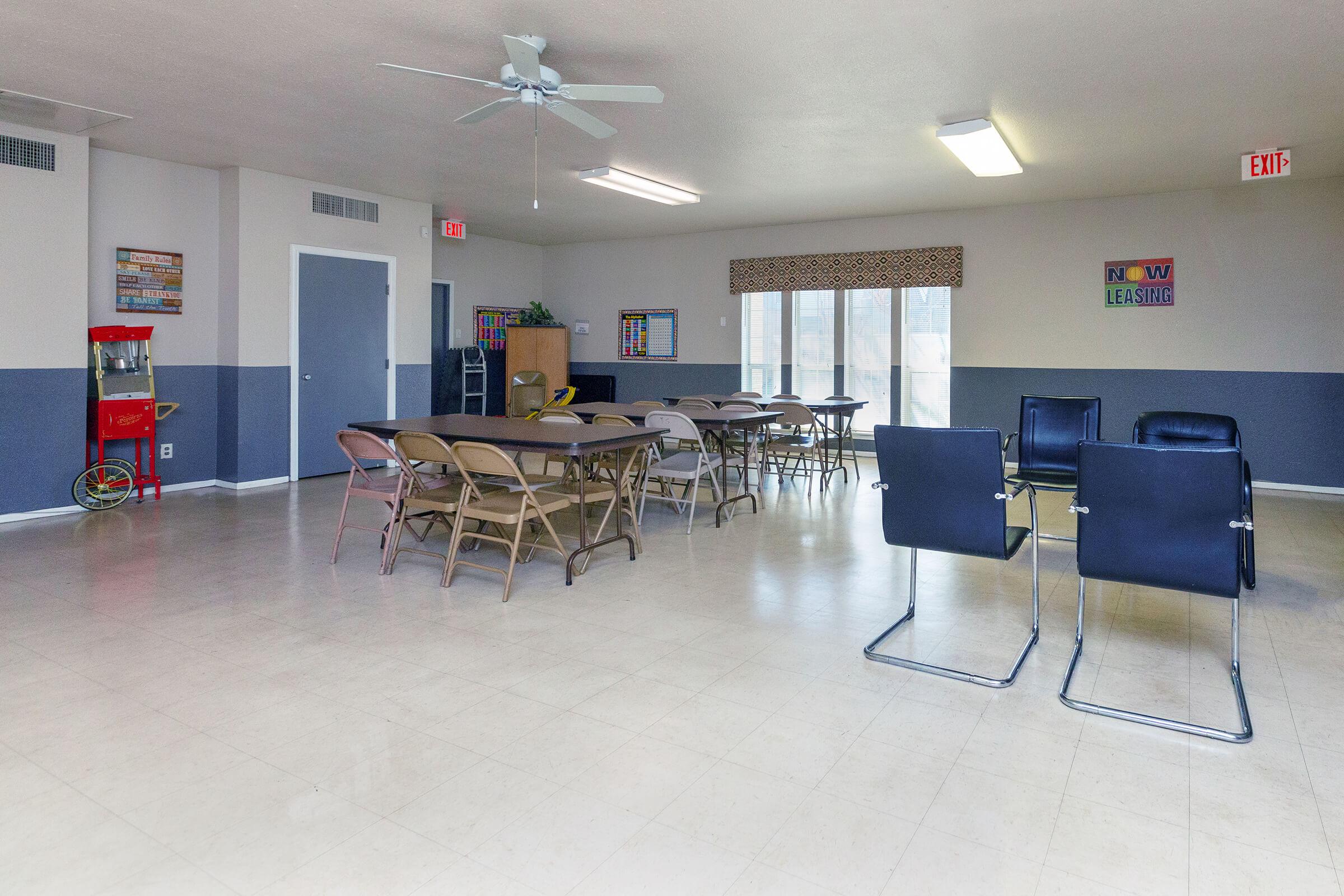 a room filled with furniture and a table