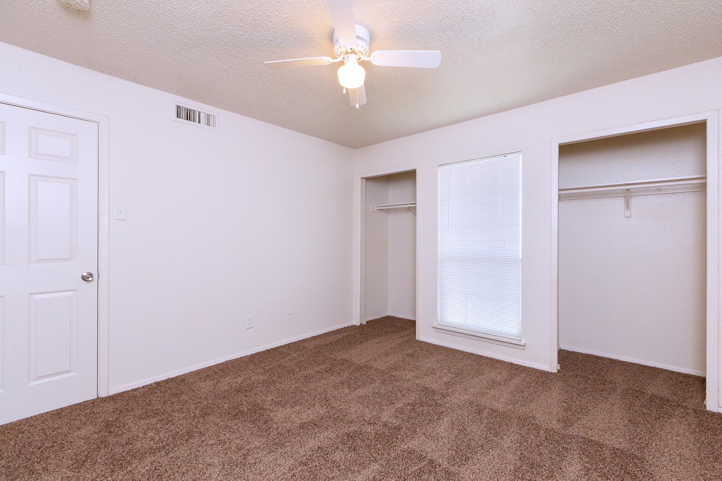 a kitchen with a white door