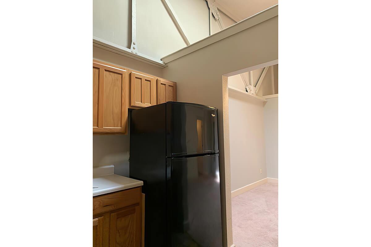 a stainless steel refrigerator in a kitchen