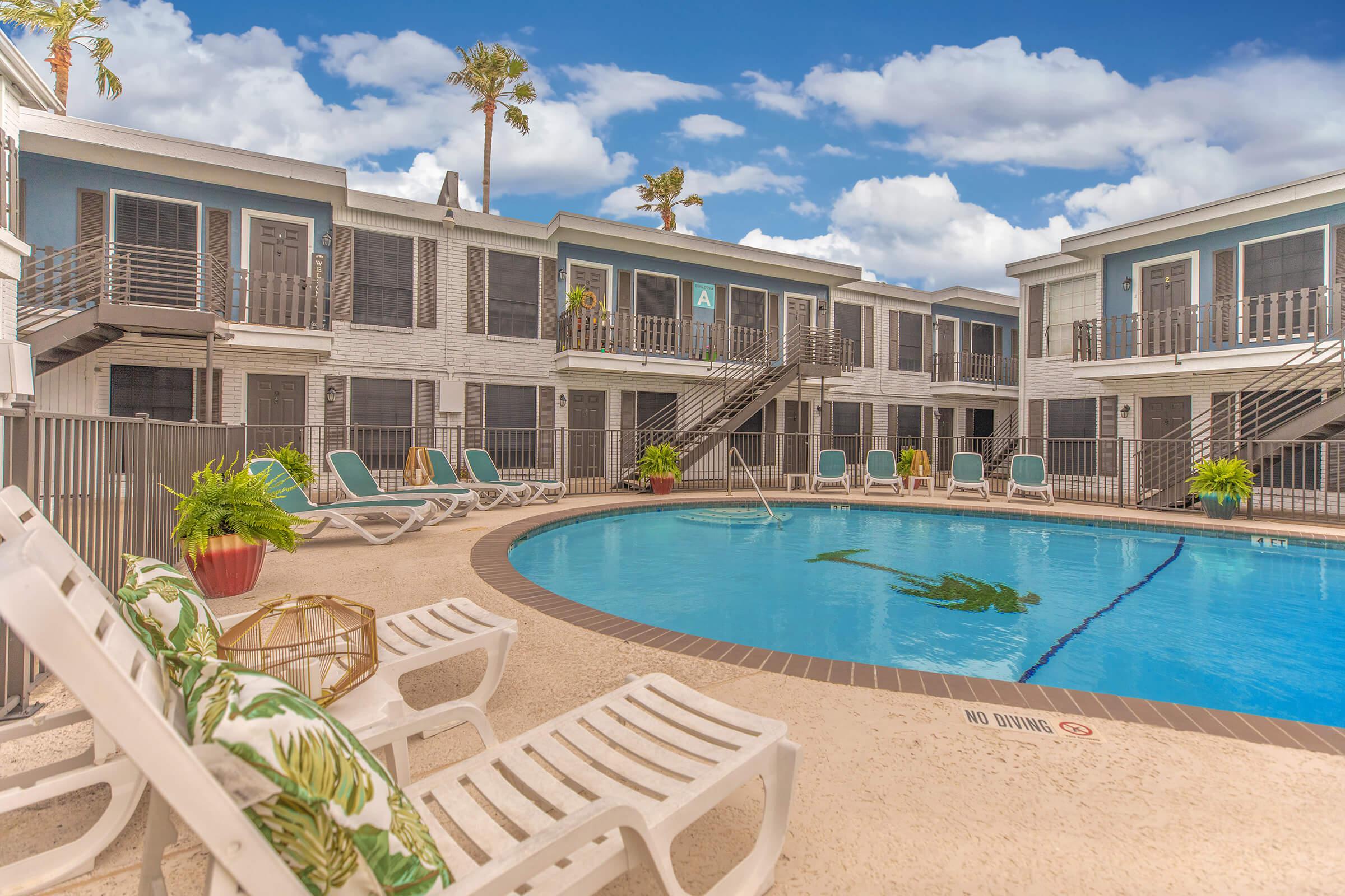 a large pool of water in front of a building