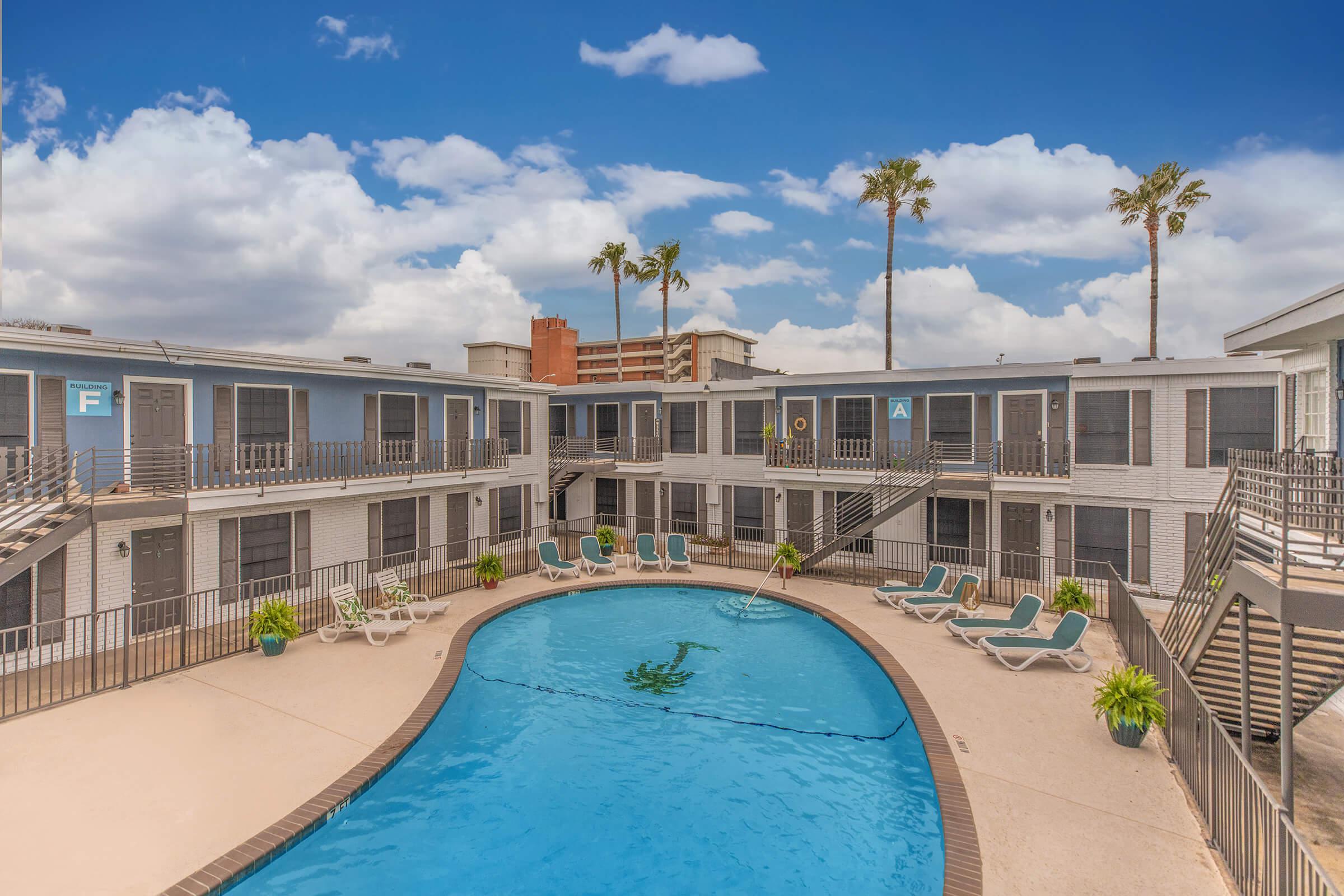 a pool next to a building