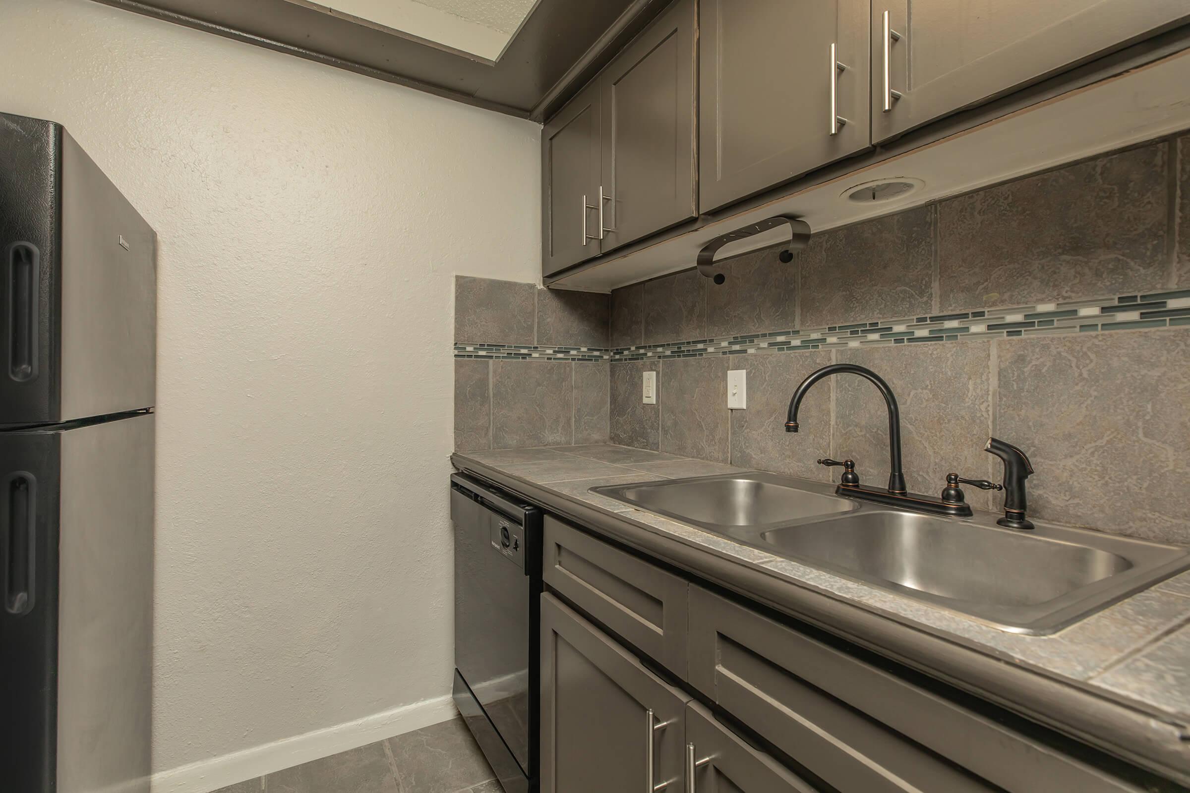 a kitchen with stainless steel appliances