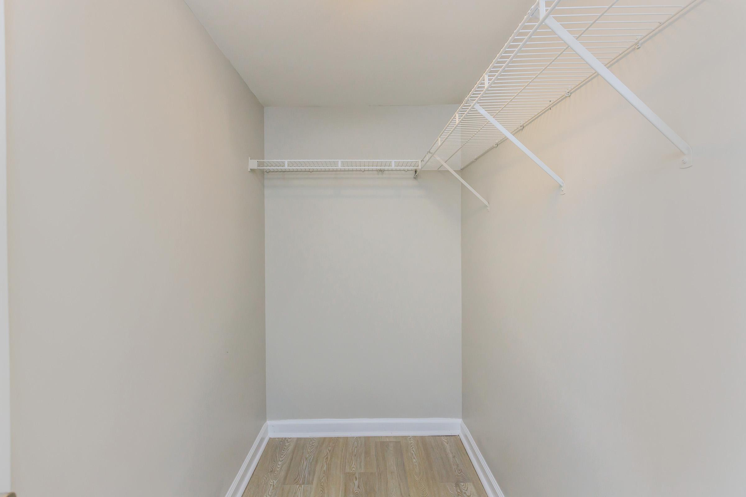 CAVERNOUS WALK-IN CLOSETS