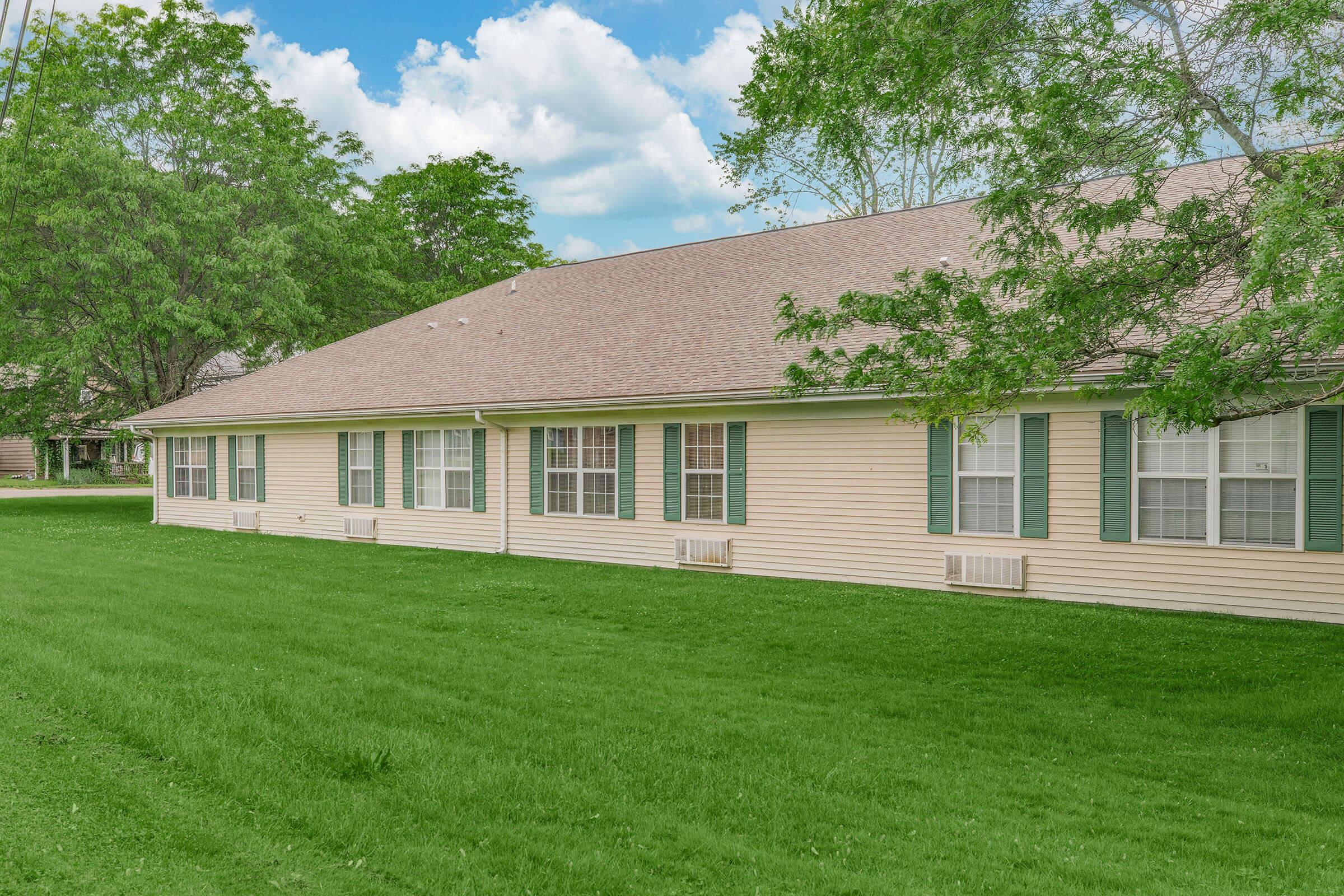 a large lawn in front of a house