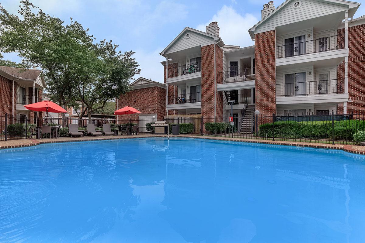 a house with a large pool of water