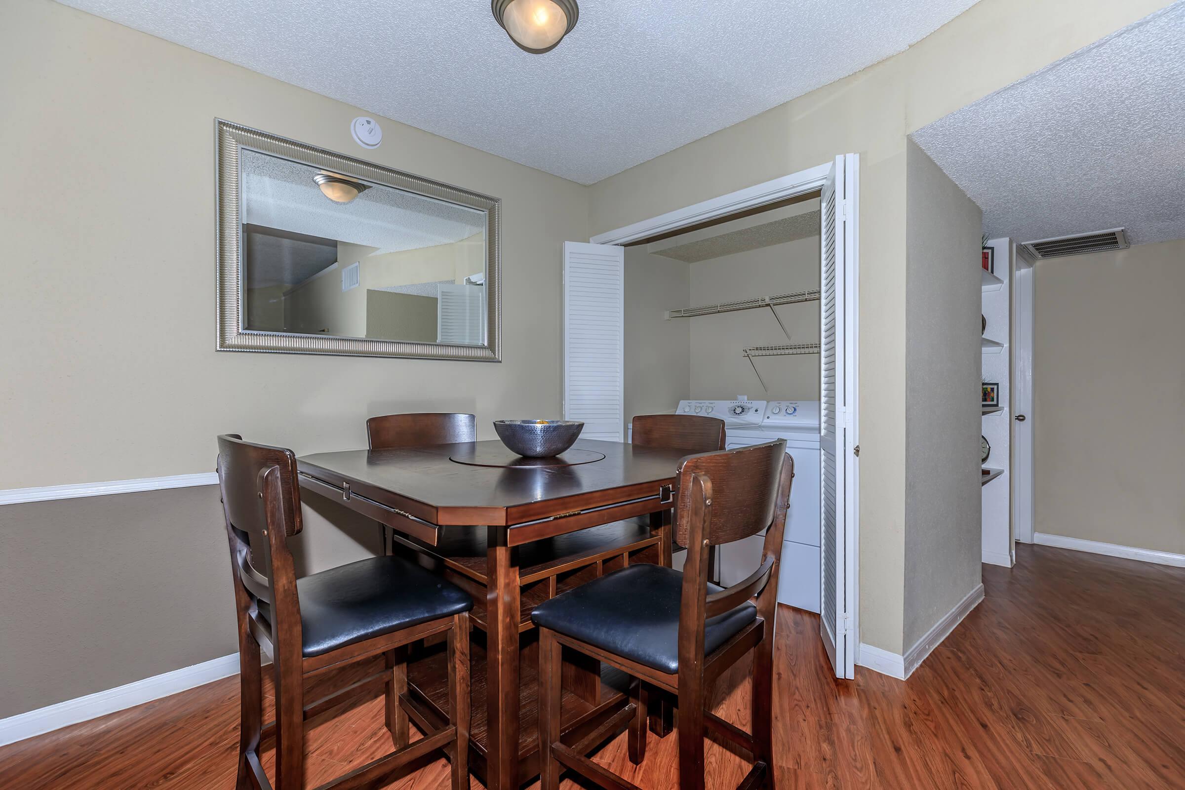 a room filled with furniture and a wood floor