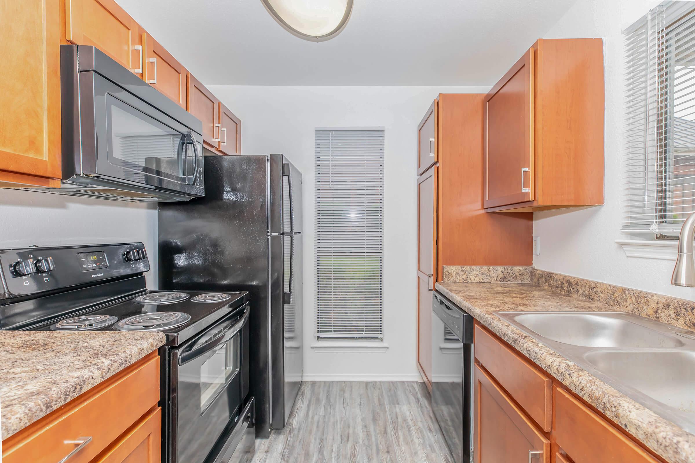 a modern kitchen with stainless steel appliances