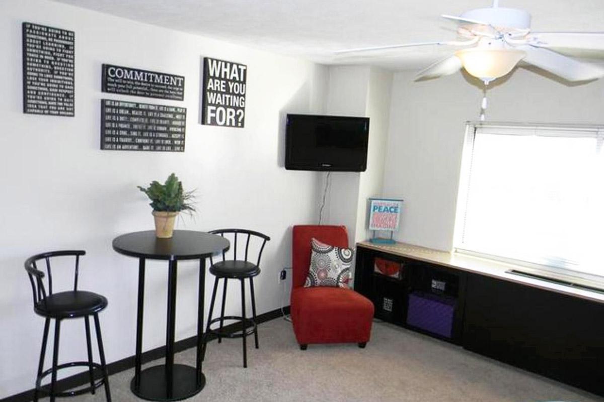 a desk with a chair in a room