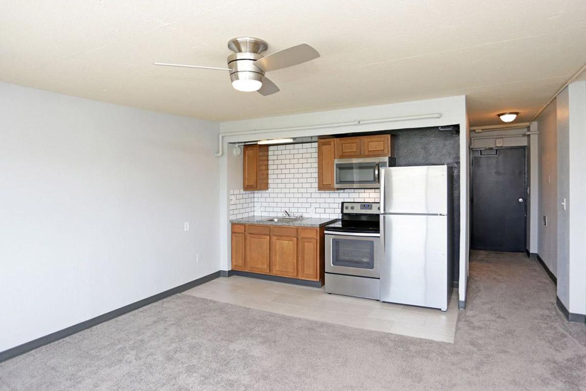 a kitchen with a wood floor