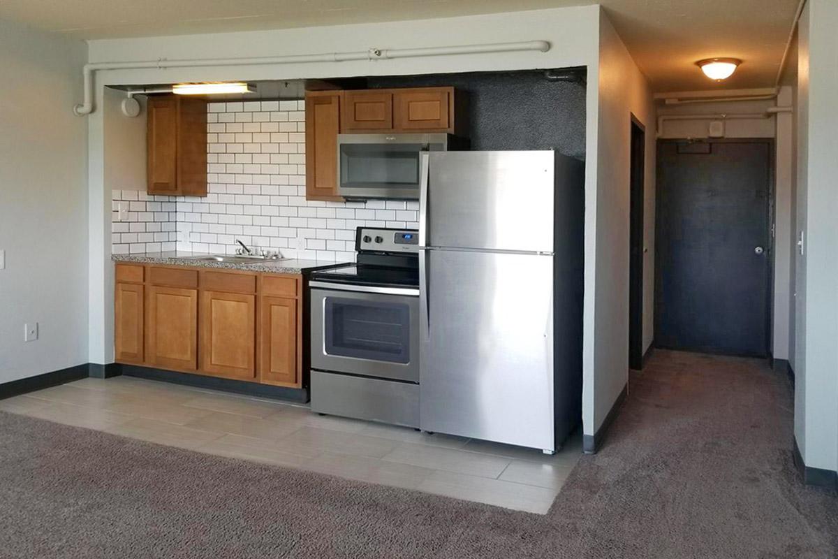 a stainless steel refrigerator in a kitchen