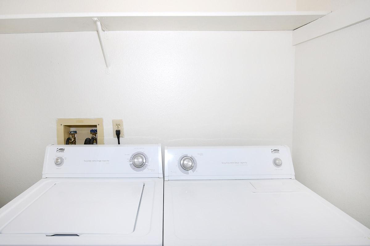 a white microwave oven sitting on top of a stove