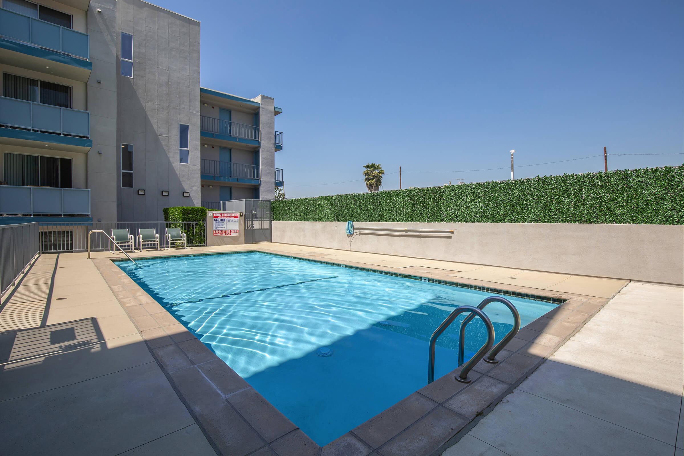 a pool next to a building