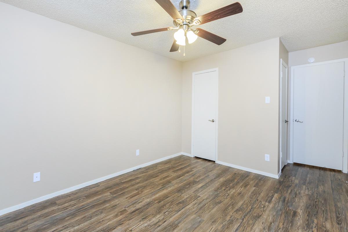 a kitchen with a wood floor