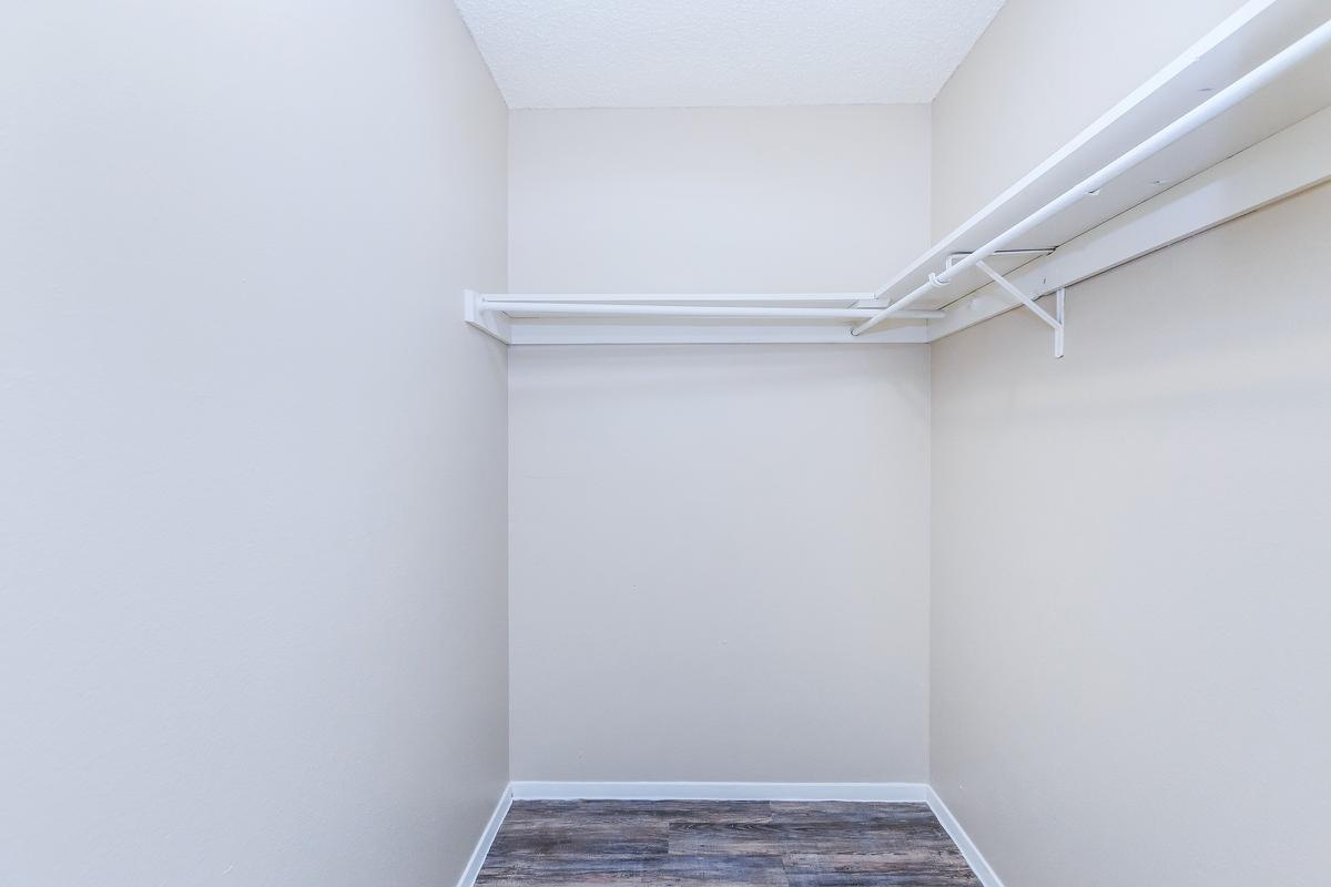 a white refrigerator freezer sitting in a room