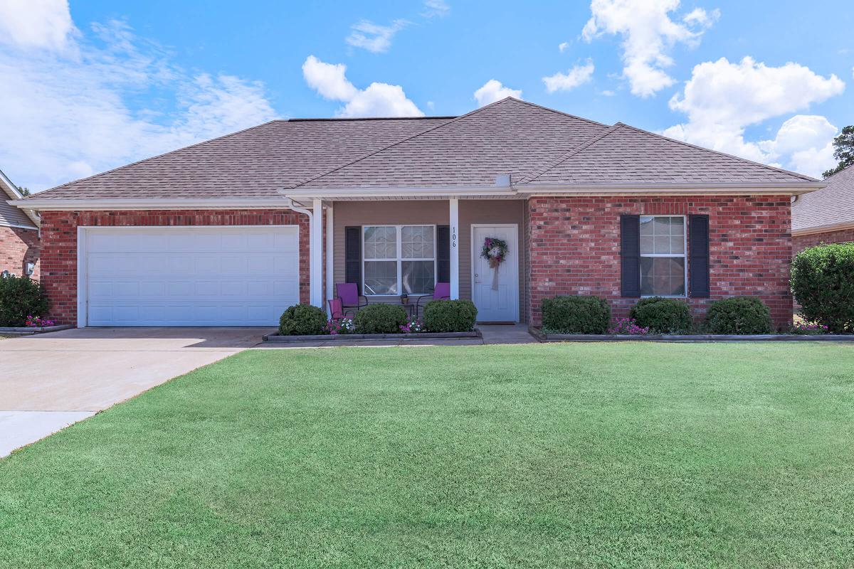 a large lawn in front of a house