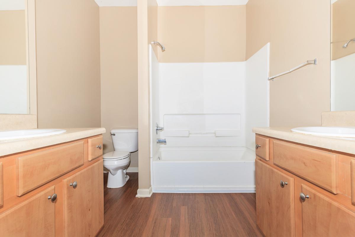 a kitchen with a sink and a shower