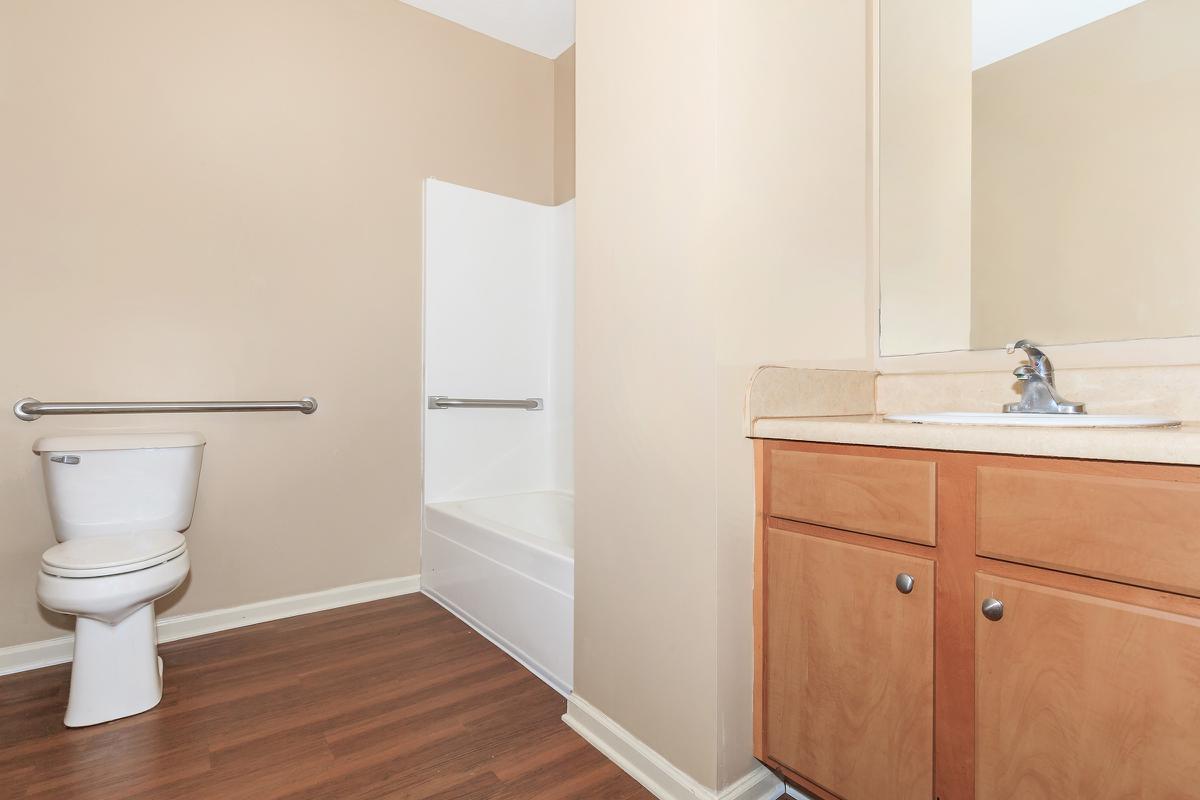 a room with a sink and a shower