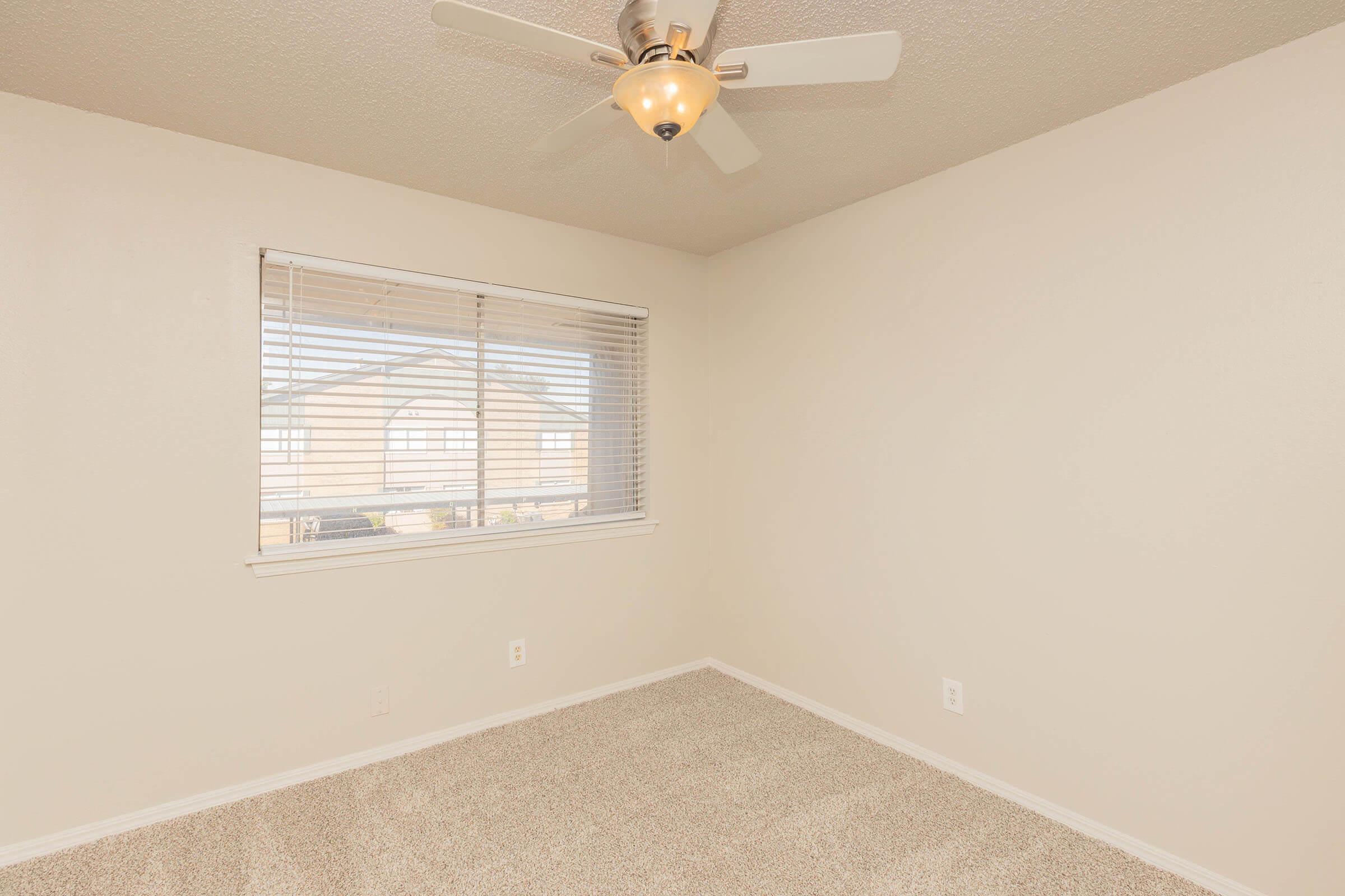 a room with a sink and a window