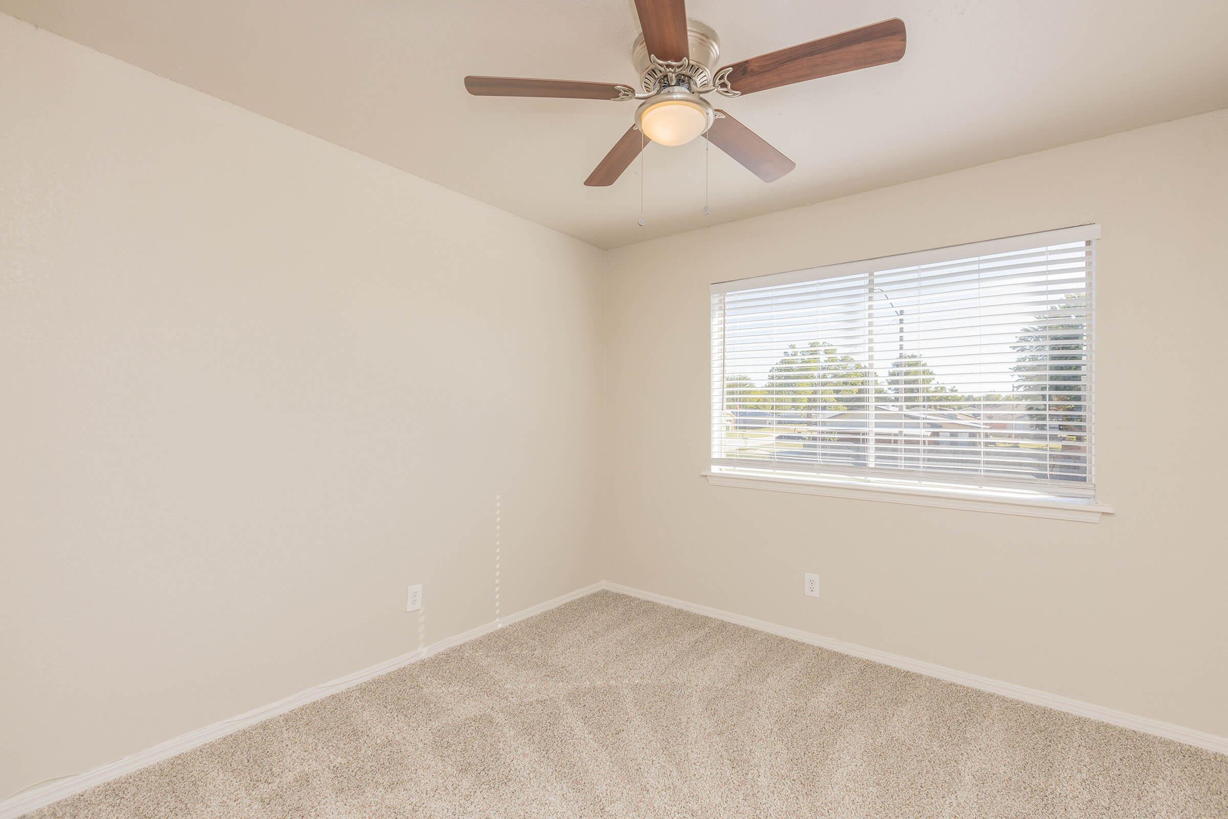 a room with a sink and a window