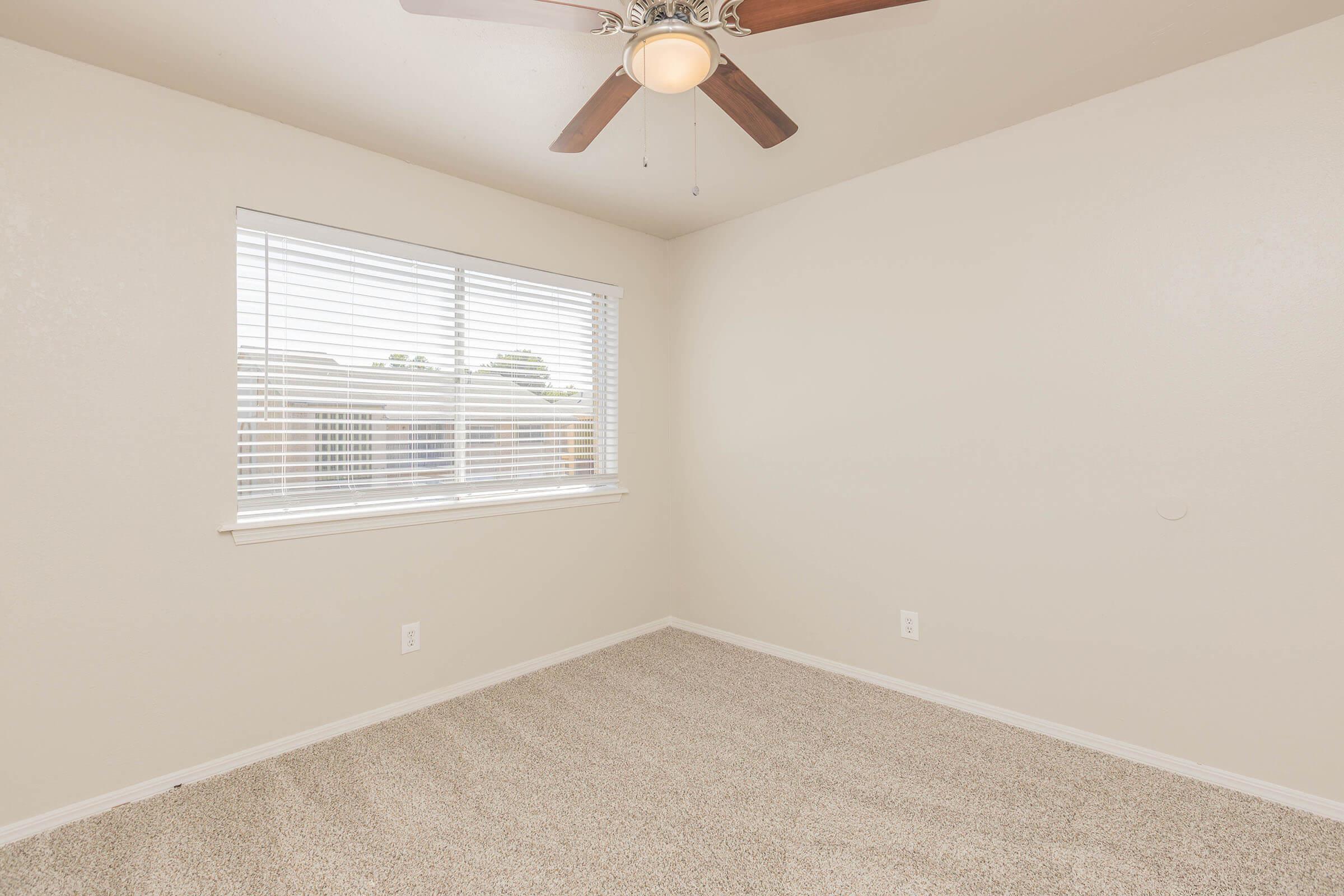 a room with a sink and a window