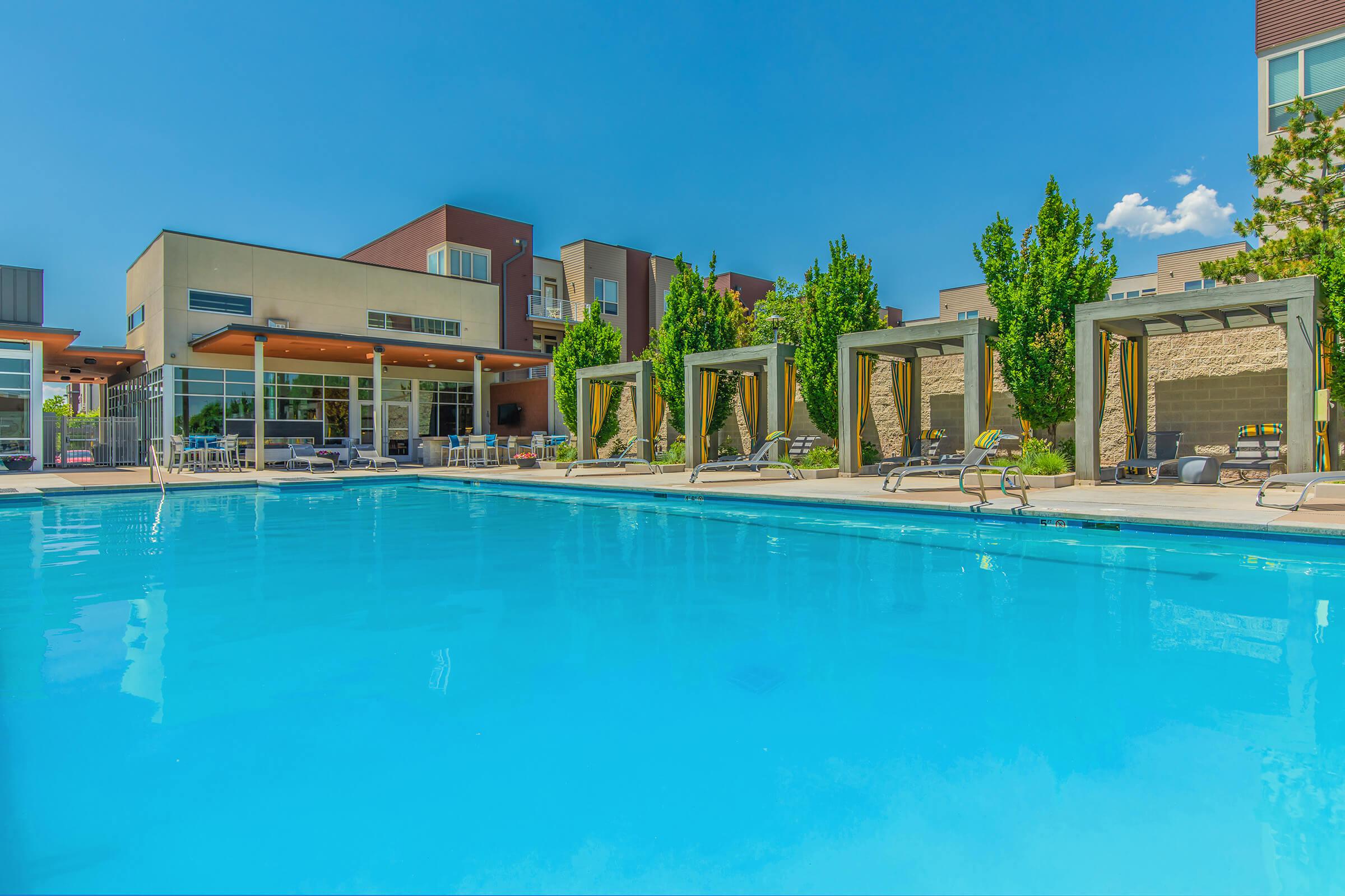 a large pool of water in front of a building