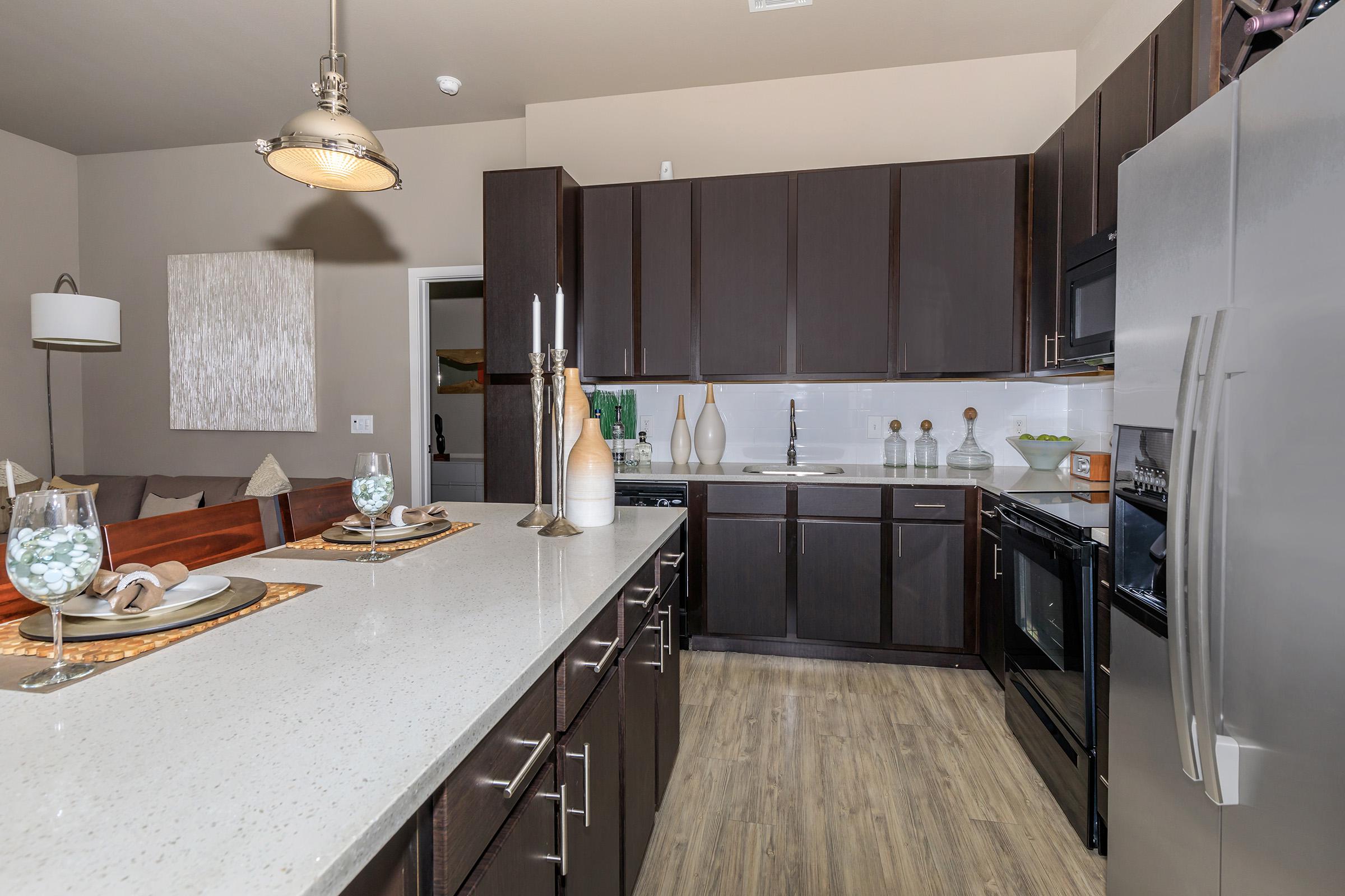 a modern kitchen with stainless steel appliances