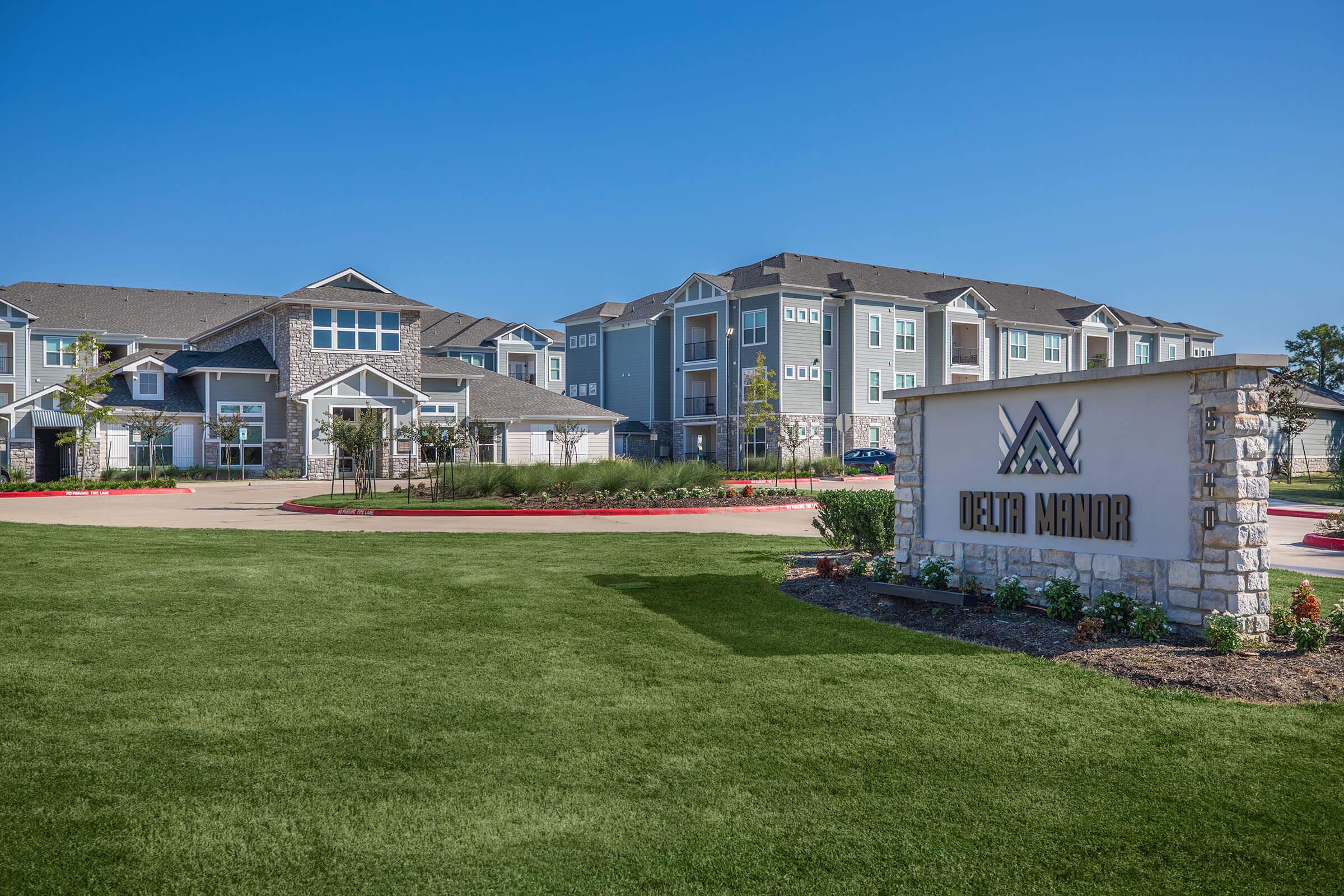 a large lawn in front of a house