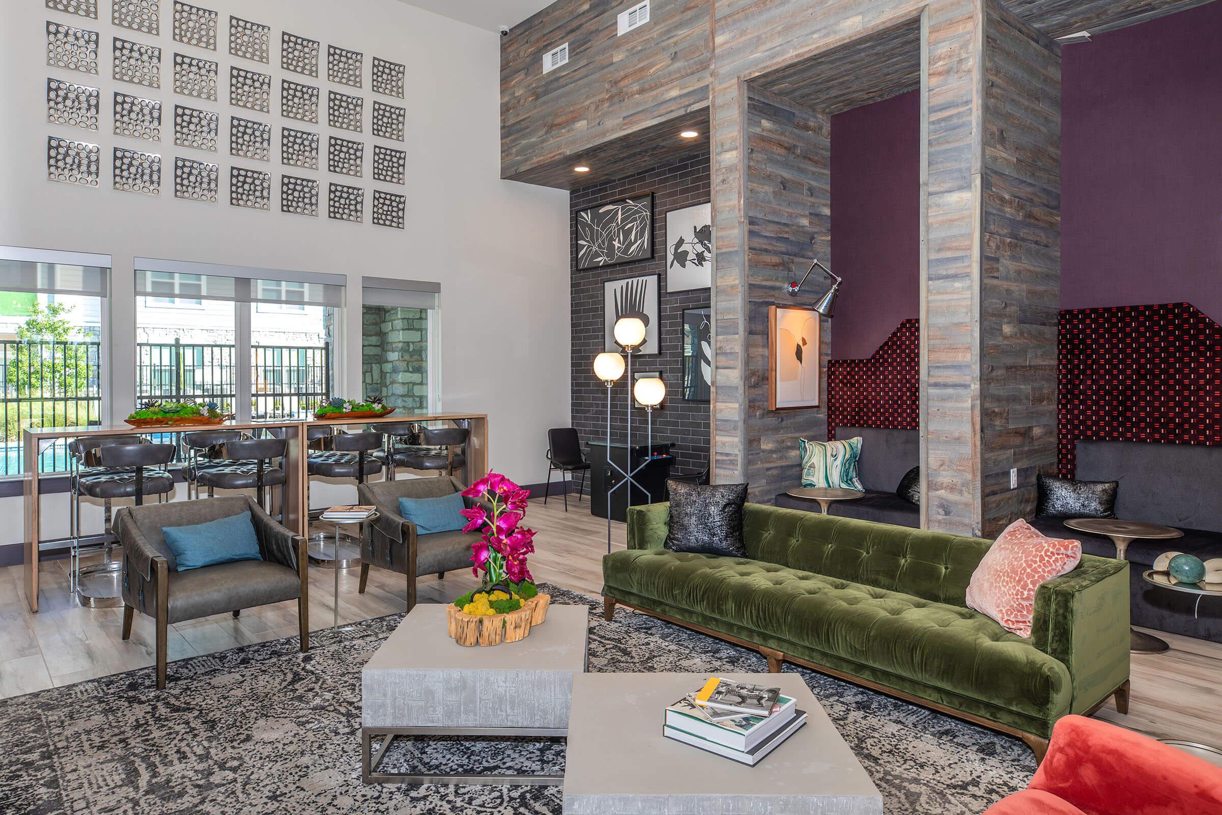 a living room filled with furniture and a fire place