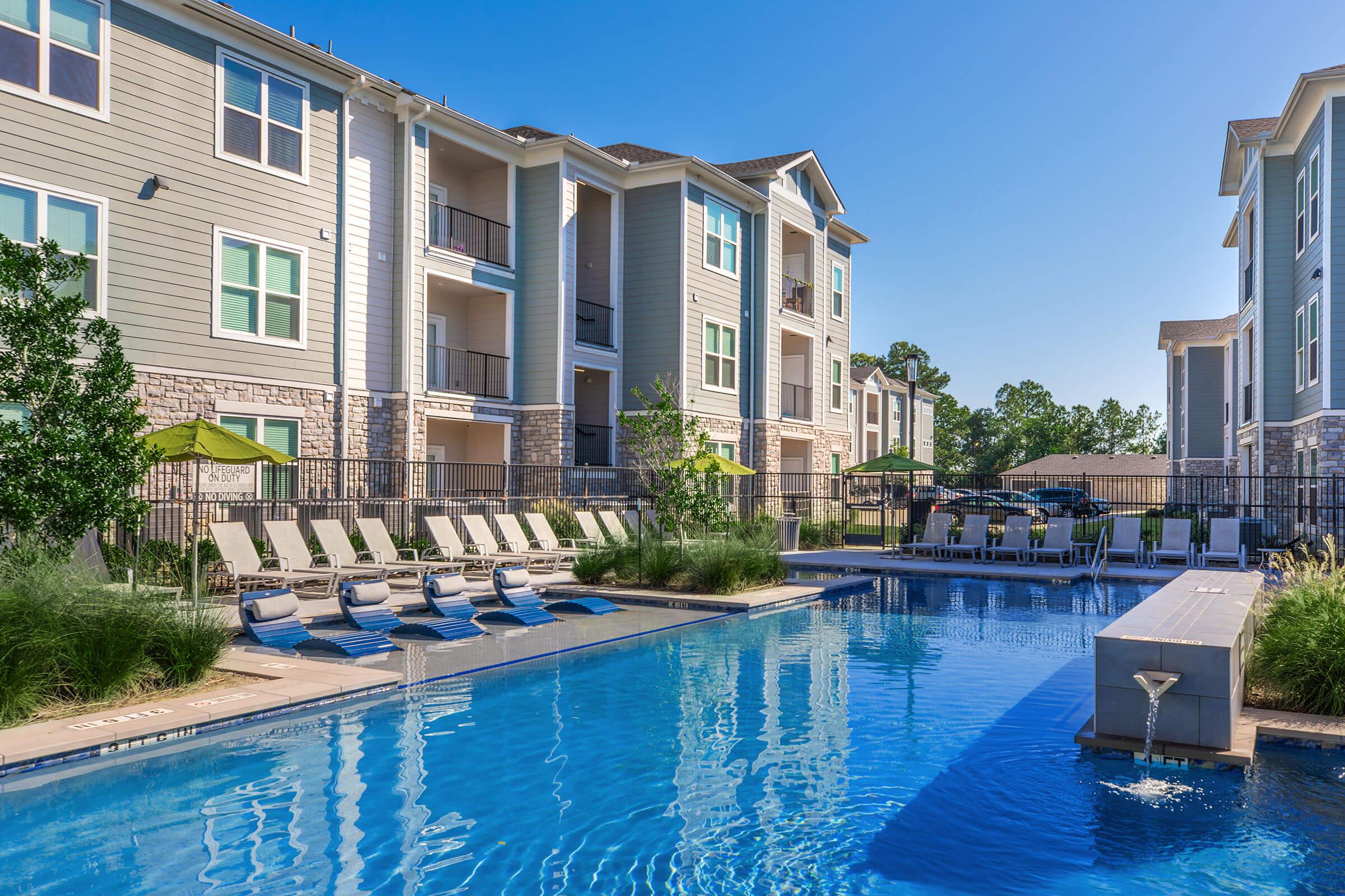 a house with a large pool of water