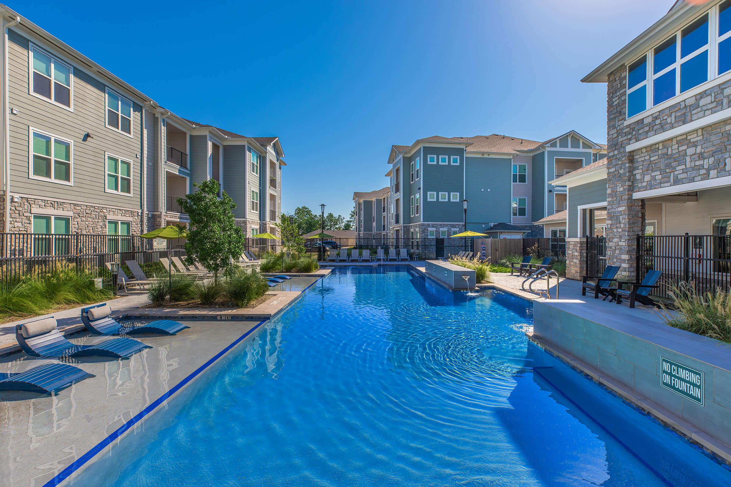 a house with a large pool of water