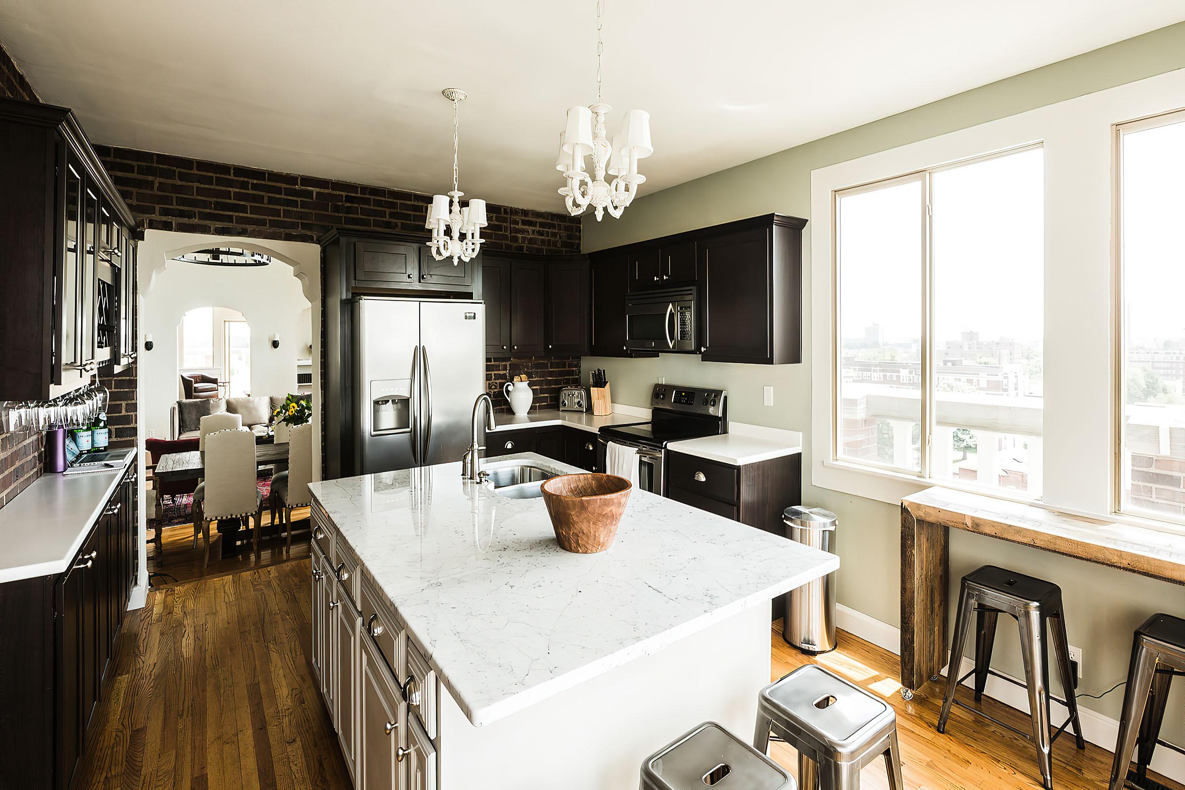 a kitchen with a sink and a window