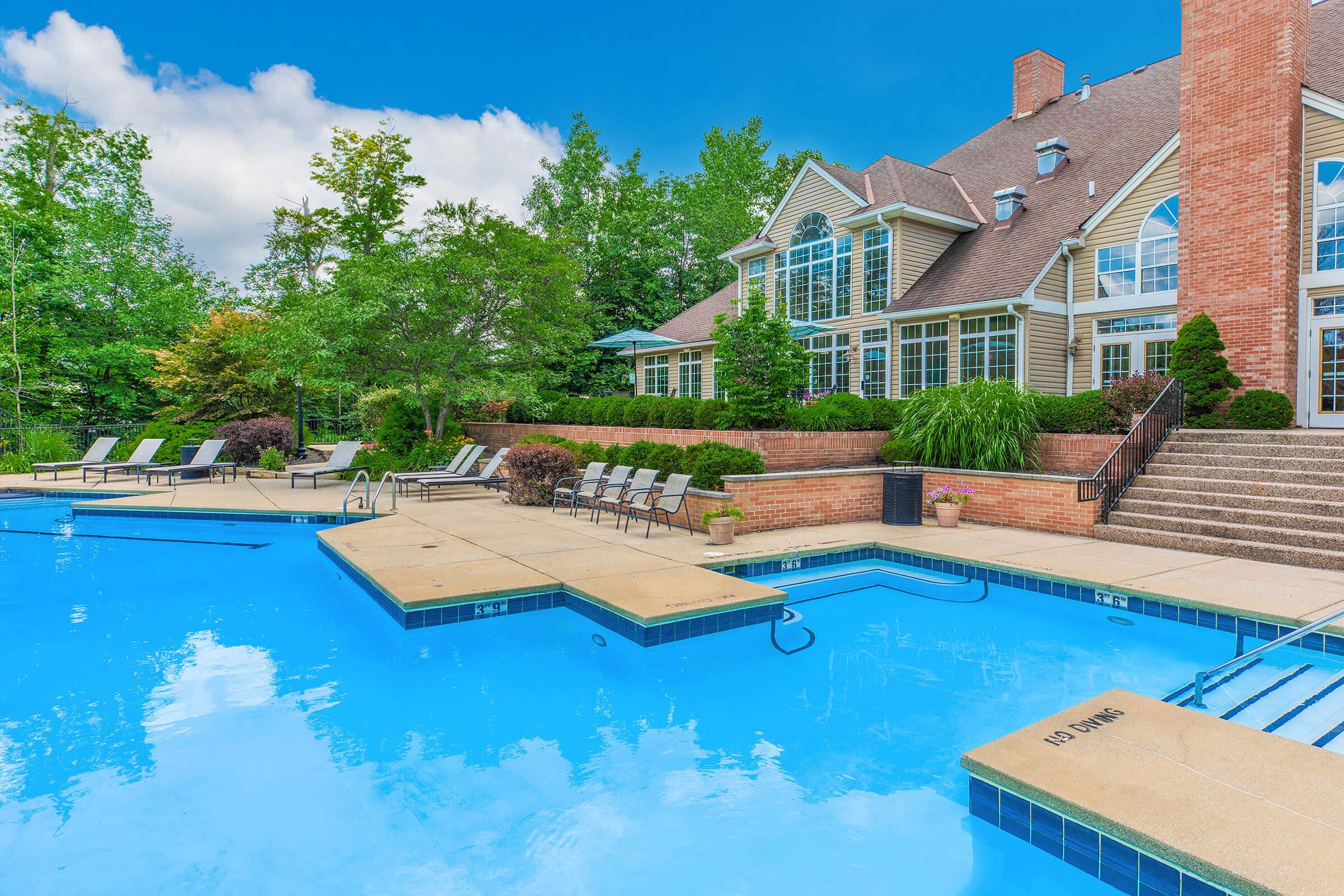 a house with a large pool of water