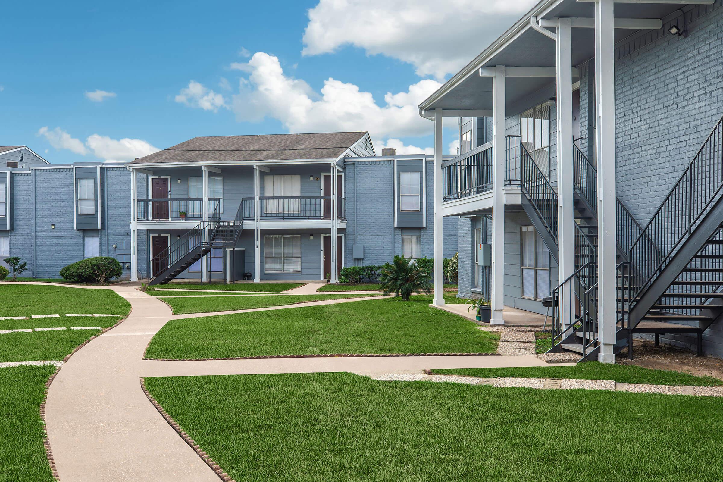 a large lawn in front of a house